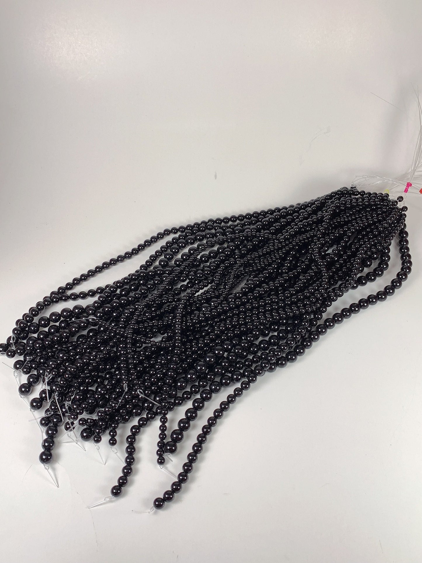 AAA Black Onyx Beads: 15.5" Smooth Round Gemstone Strand