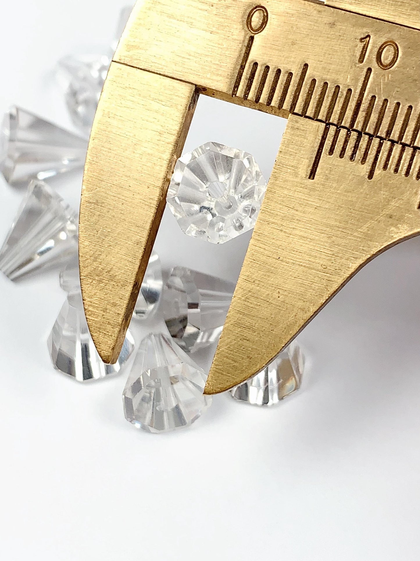 AAA White Clear Quartz Gemstone: Faceted Cone Cut (10mm x 8mm)