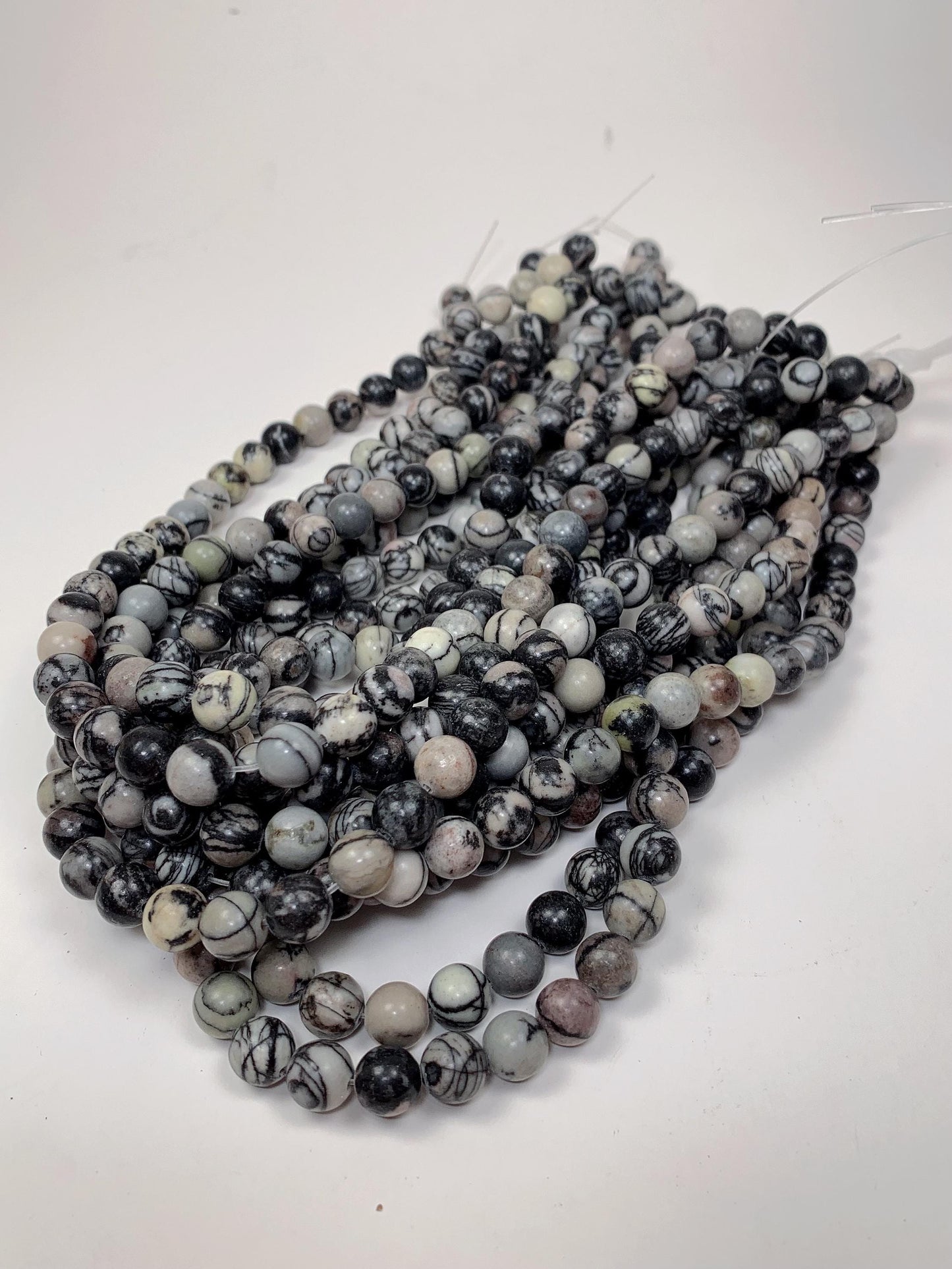 Natural Black Spider Web Jasper Beads: Smooth Round Gemstone Strand
