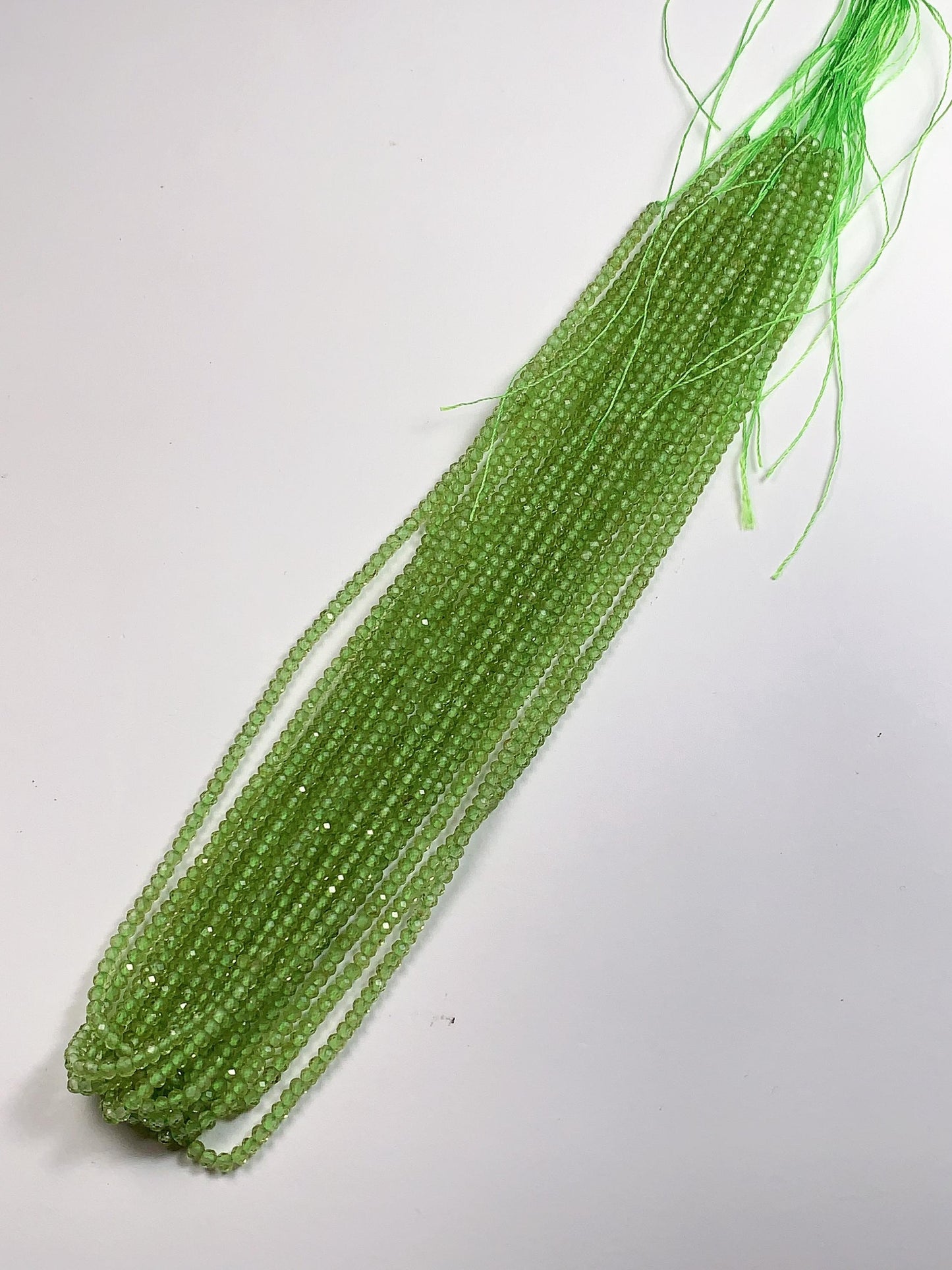 AAA Green Peridot Faceted Rondelle Beads: 2x3mm, 15.5" Strand