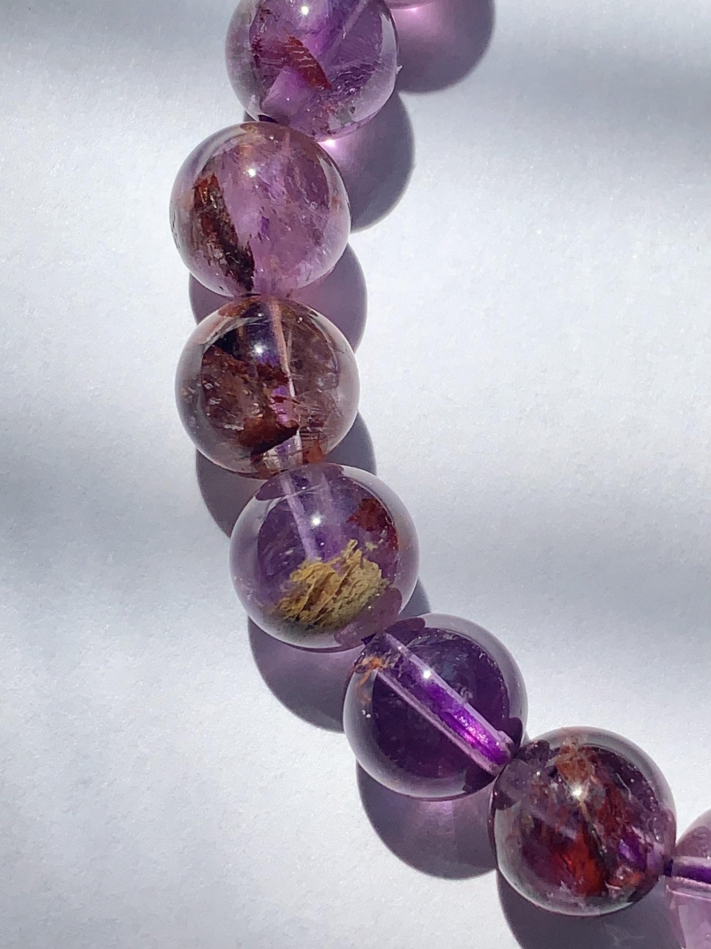 Super 7 Crystal Bracelet: Natural Amethyst Cacoxenite Quartz, Purple Brown Gemstone