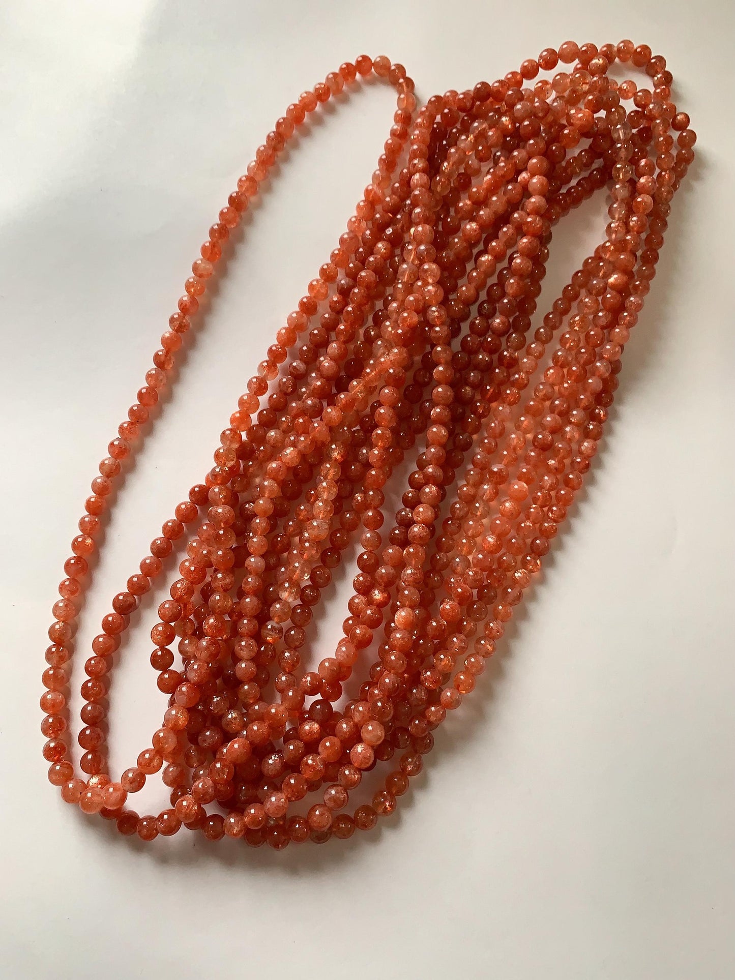 6mm AAA Golden Orange Sunstone Smooth Round Beads: 15.5" Strand