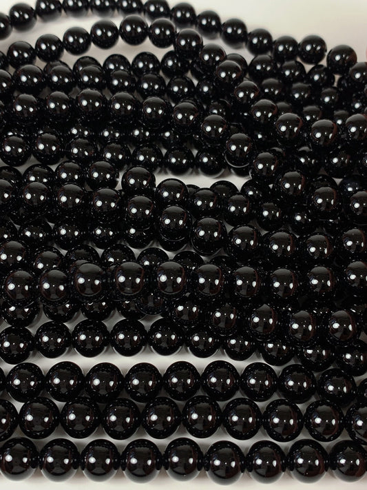 AAA Black Onyx Beads: 15.5" Smooth Round Gemstone Strand