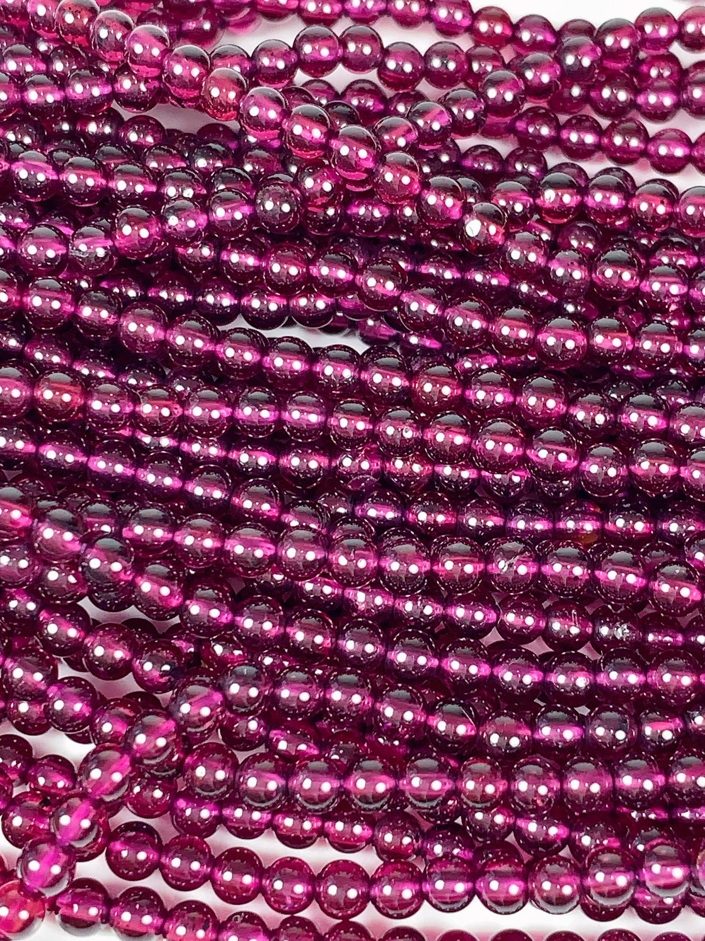 AAA Mozambique Purple Garnet Beads: Natural Smooth Round Gemstone, 15.5" Strand