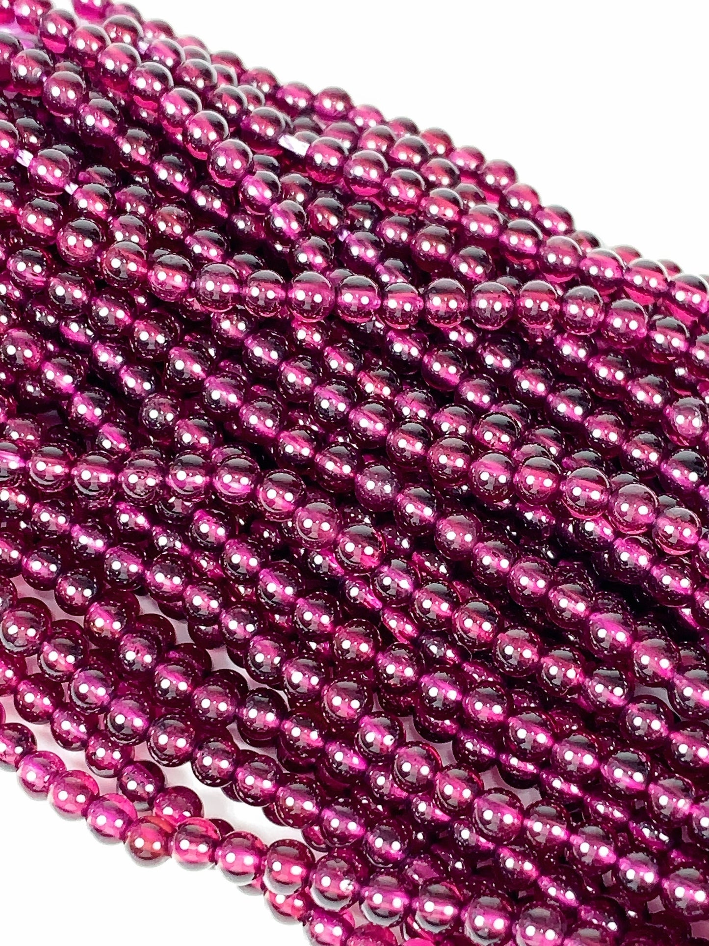 AAA Mozambique Purple Garnet Beads: Natural Smooth Round Gemstone, 15.5" Strand