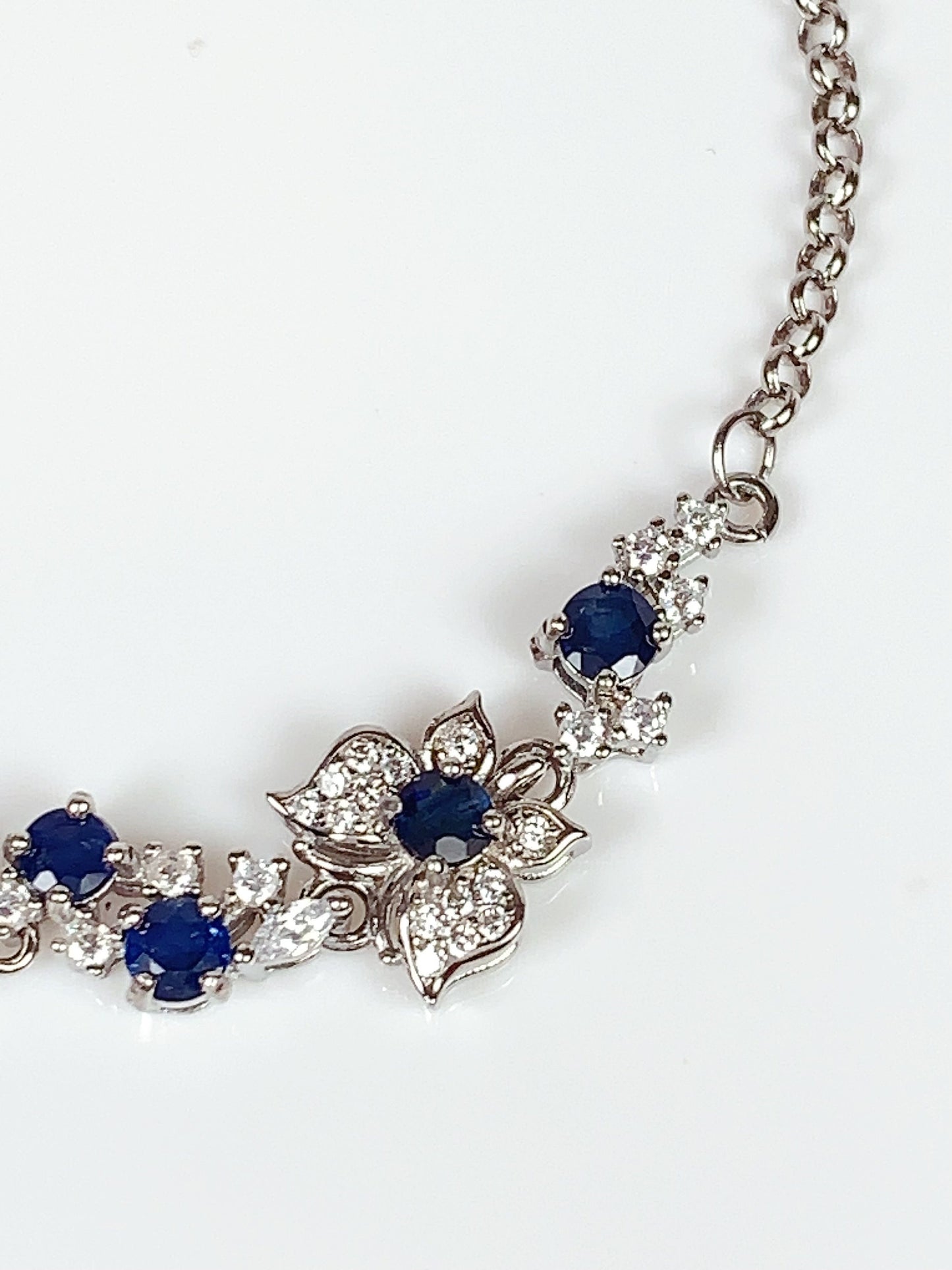 Blue Sapphire Floral Bracelet: 18K White Gold Plated Sterling Silver