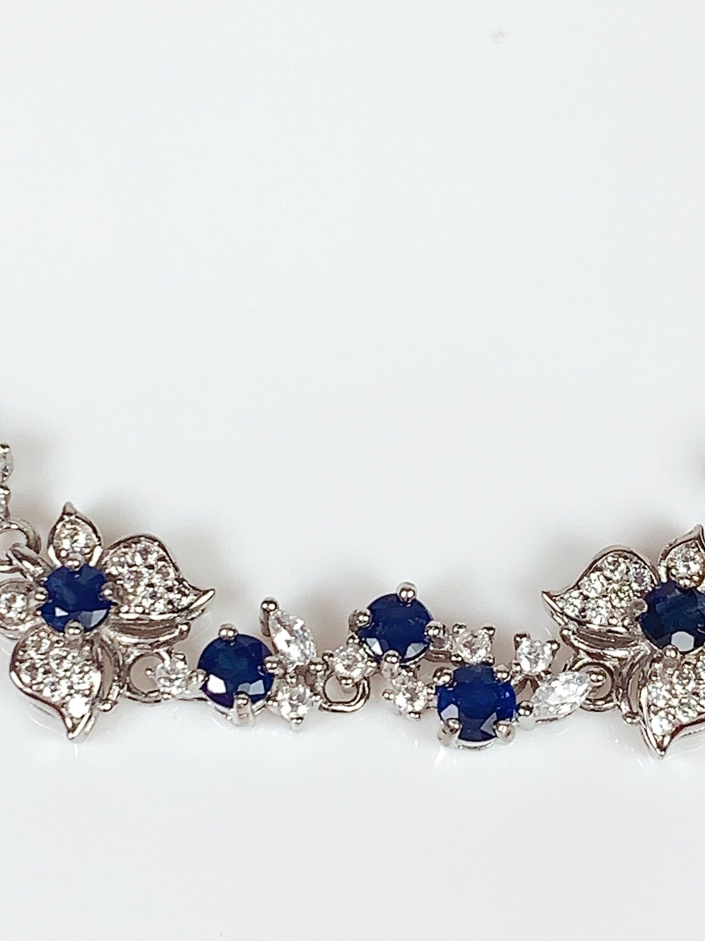 Blue Sapphire Floral Bracelet: 18K White Gold Plated Sterling Silver