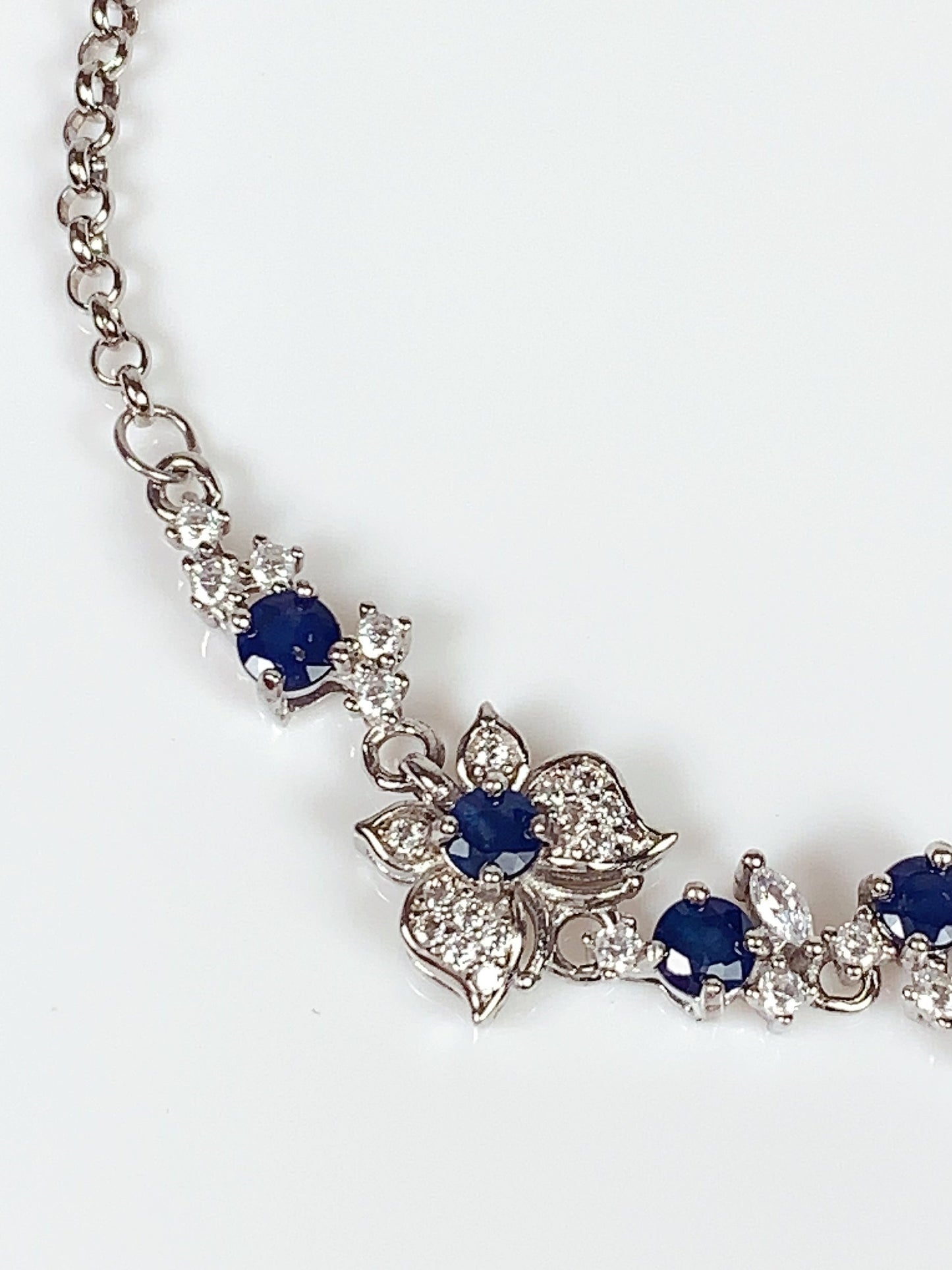 Blue Sapphire Floral Bracelet: 18K White Gold Plated Sterling Silver