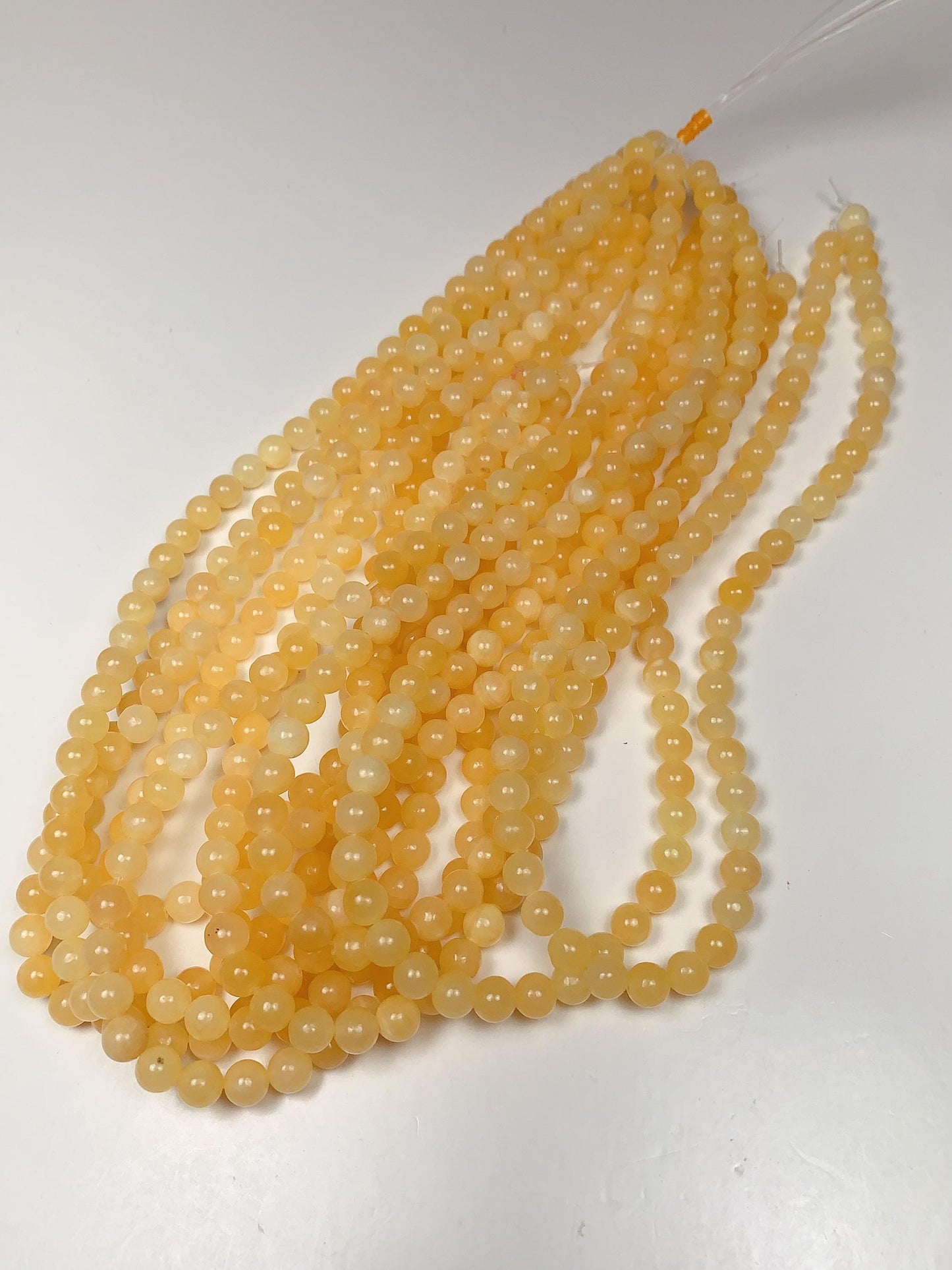 AAA Honey Yellow Jade Beads: Natural Smooth Round Gemstone Strand