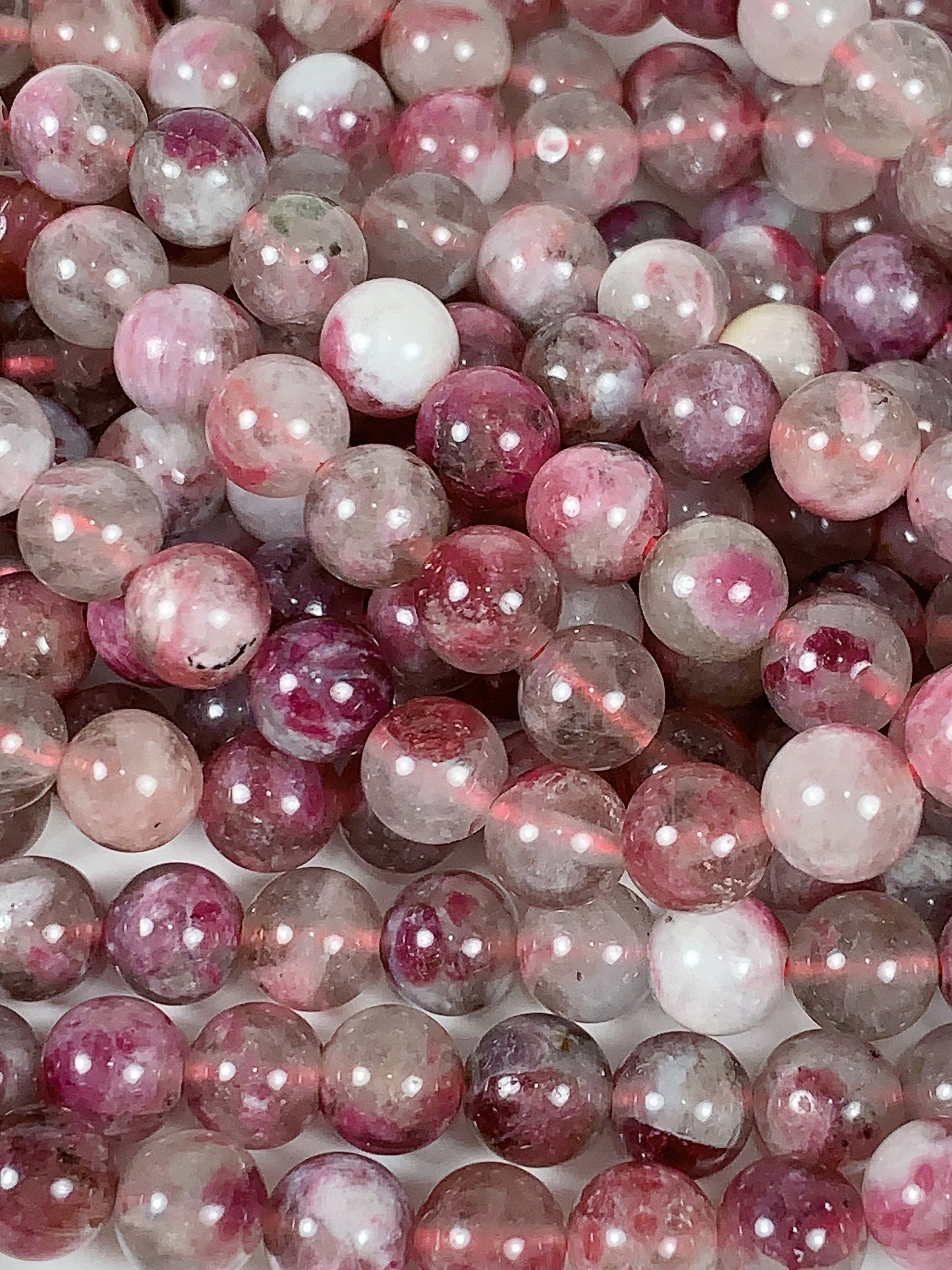 Natural Plum Blossom Pink Tourmaline Beads: Grade AA Smooth Rounds, 15.5" Strand