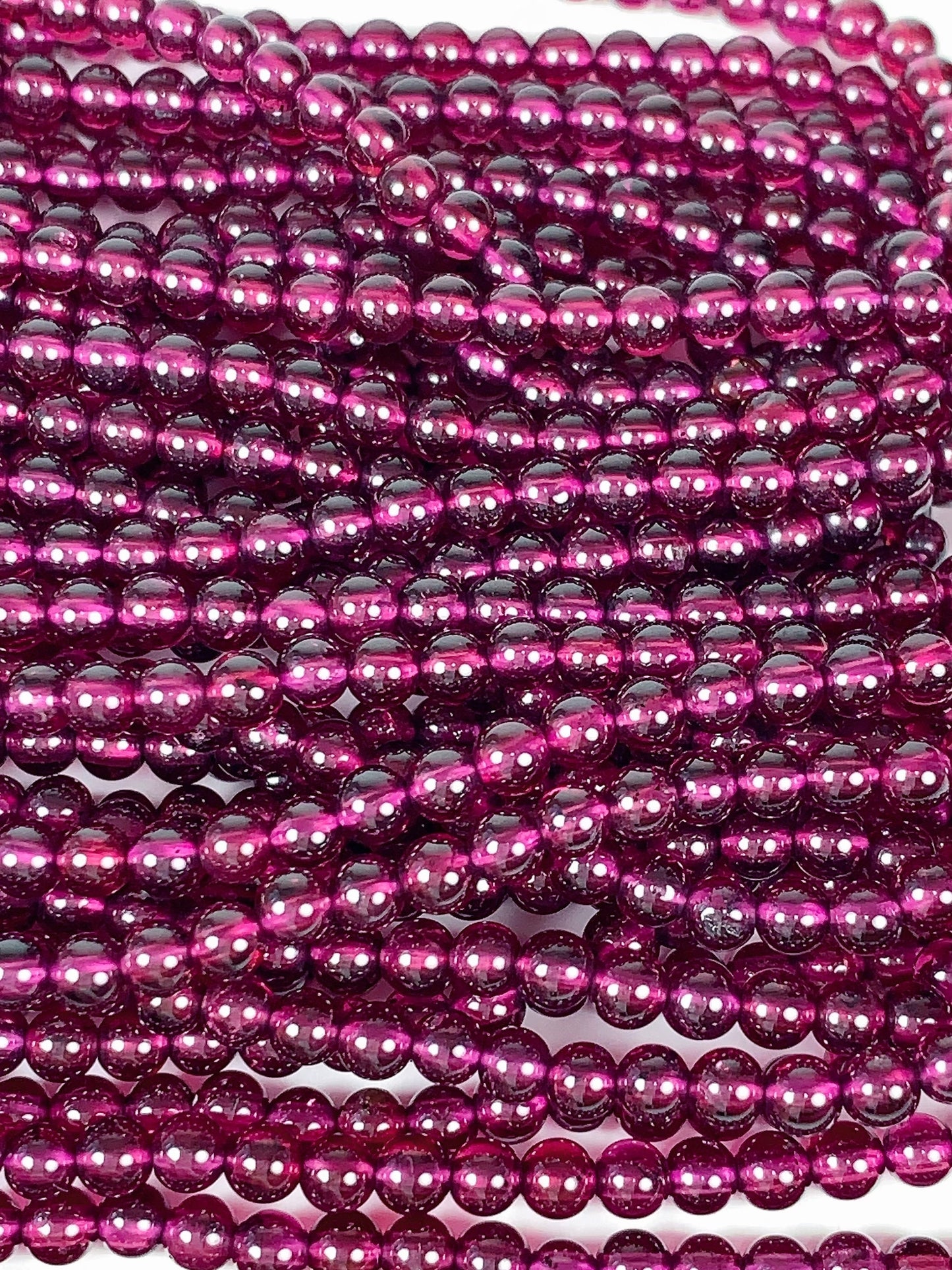 AAA Mozambique Purple Garnet Beads: Natural Smooth Round Gemstone, 15.5" Strand