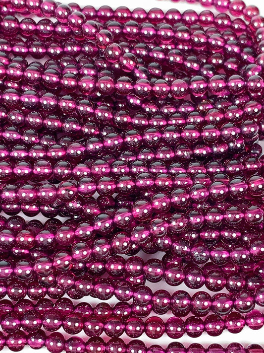 AAA Mozambique Purple Garnet Beads: Natural Smooth Round Gemstone, 15.5" Strand