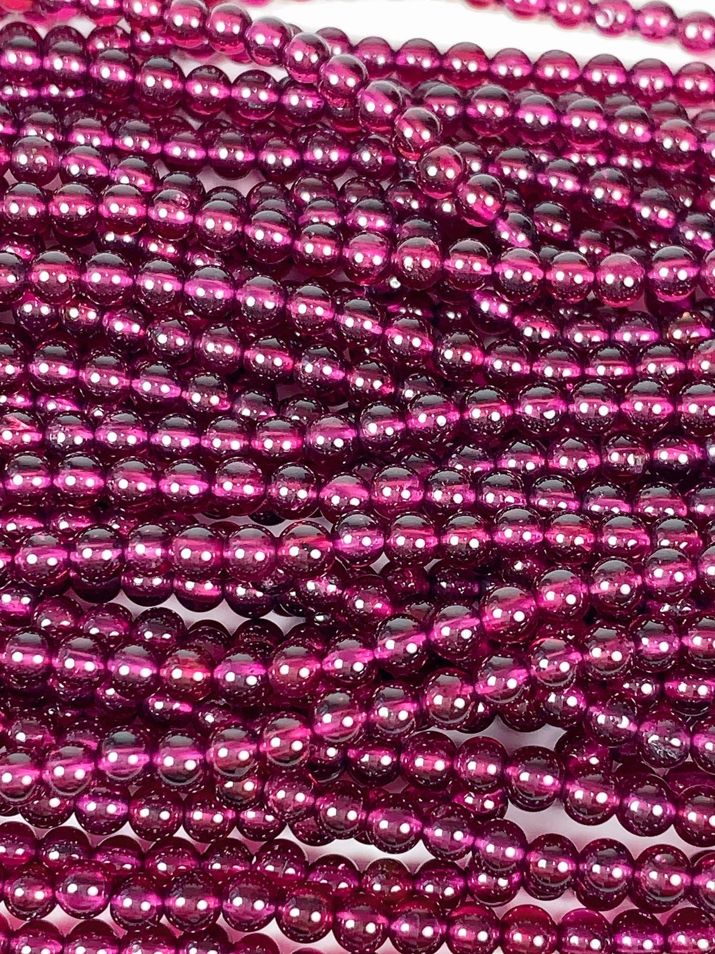 AAA Mozambique Purple Garnet Beads: Natural Smooth Round Gemstone, 15.5" Strand