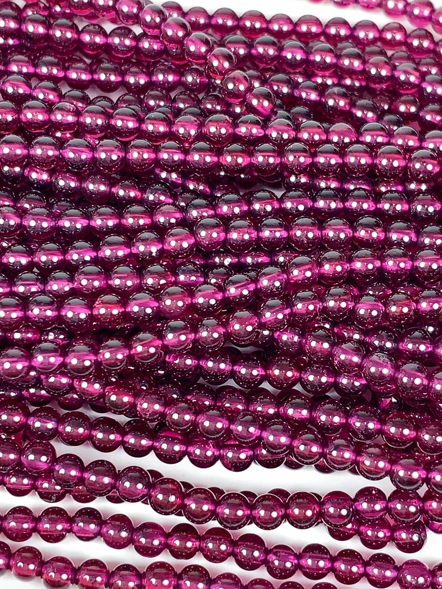 AAA Mozambique Purple Garnet Beads: Natural Smooth Round Gemstone, 15.5" Strand