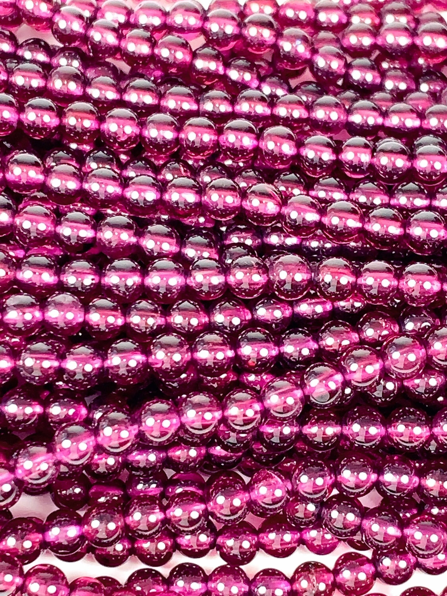 AAA Mozambique Purple Garnet Beads: Natural Smooth Round Gemstone, 15.5" Strand