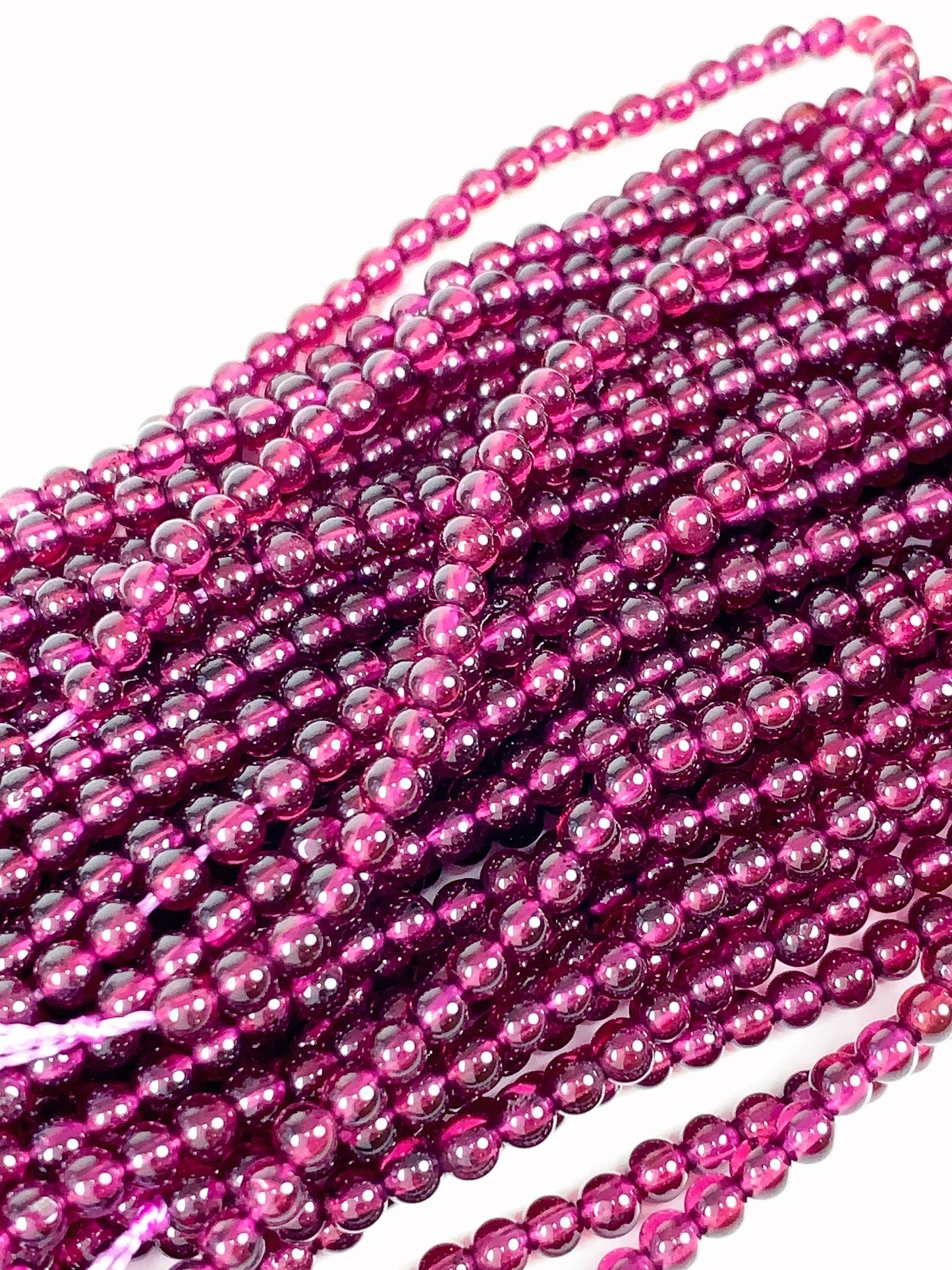 AAA Mozambique Purple Garnet Beads: Natural Smooth Round Gemstone, 15.5" Strand
