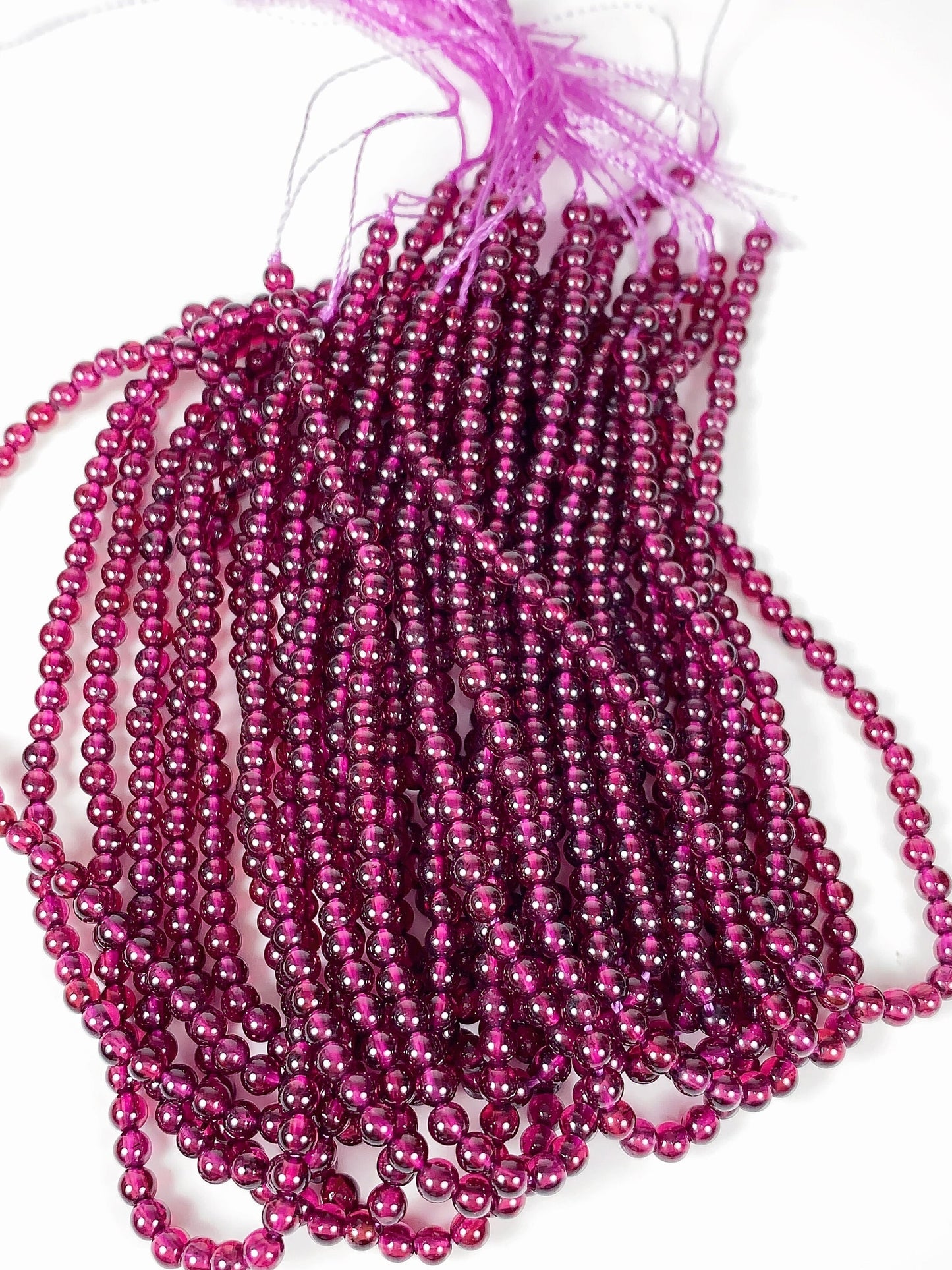 AAA Mozambique Purple Garnet Beads: Natural Smooth Round Gemstone, 15.5" Strand