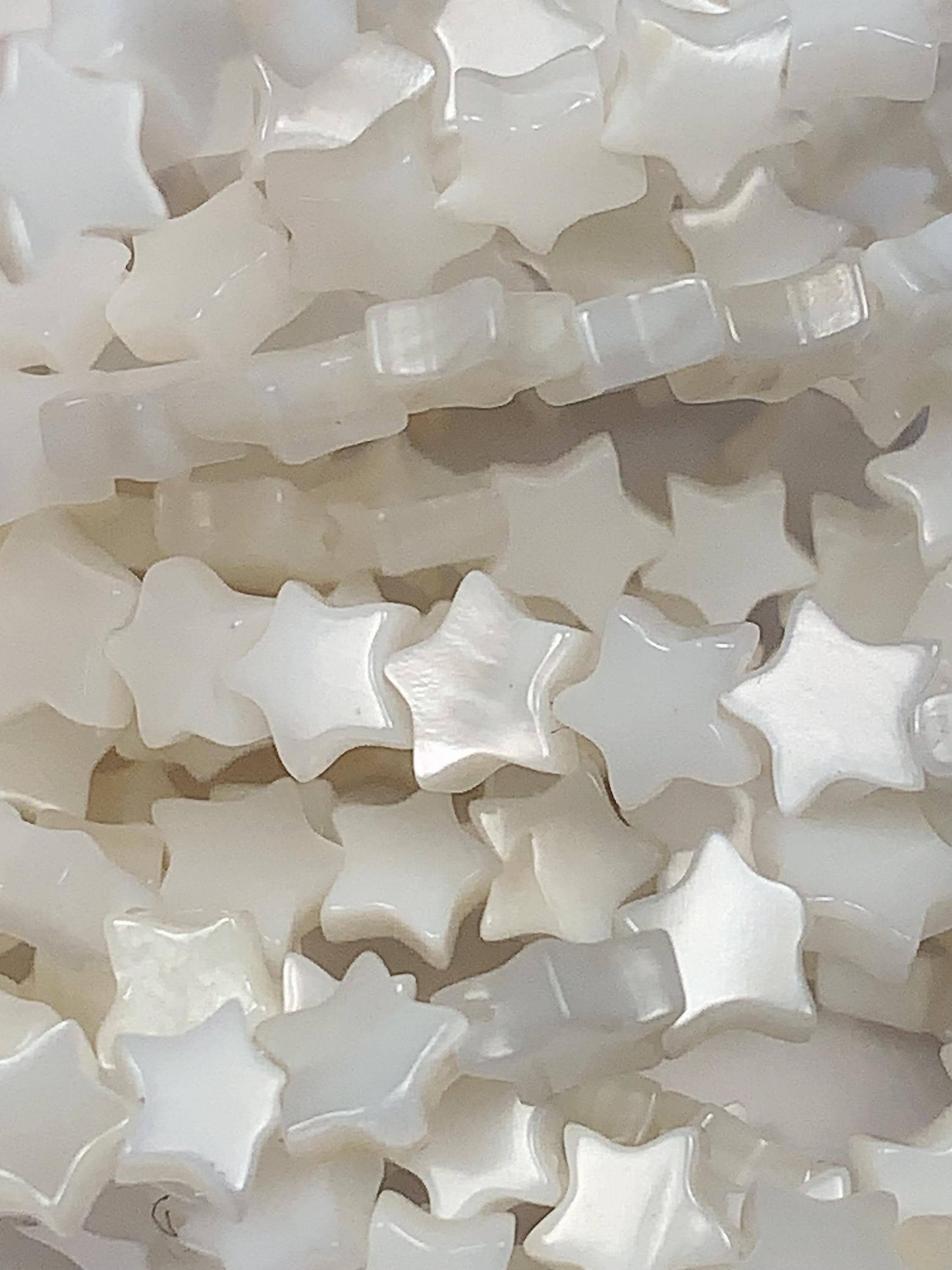 6mm AAA White Mother of Pearl Star Beads: 15" Strand