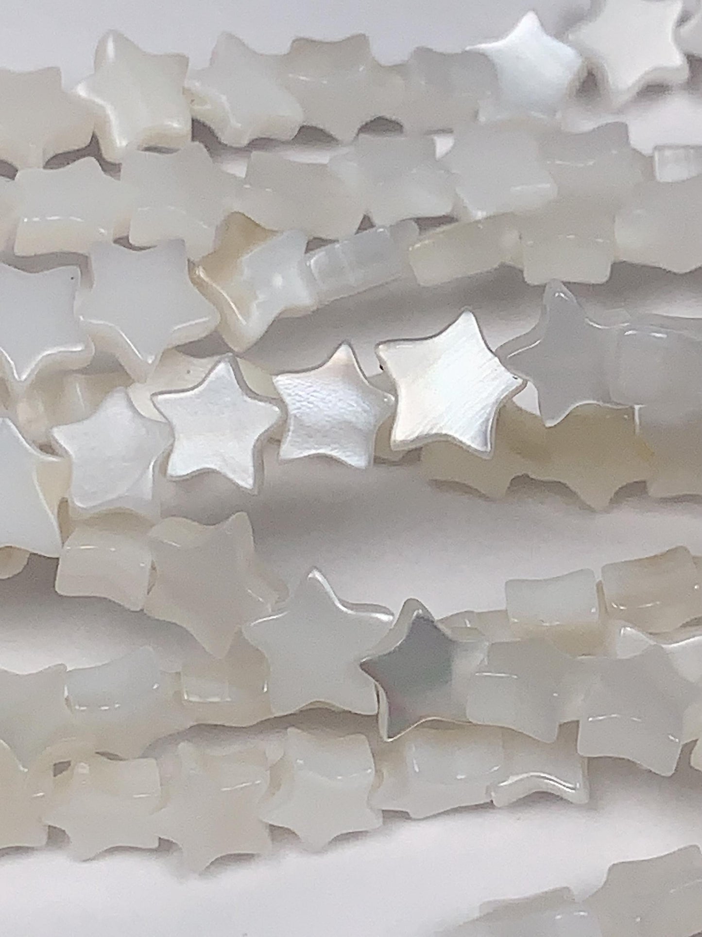 6mm AAA White Mother of Pearl Star Beads: 15" Strand