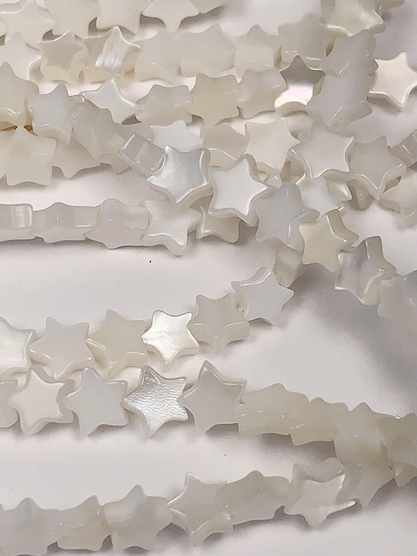 6mm AAA White Mother of Pearl Star Beads: 15" Strand