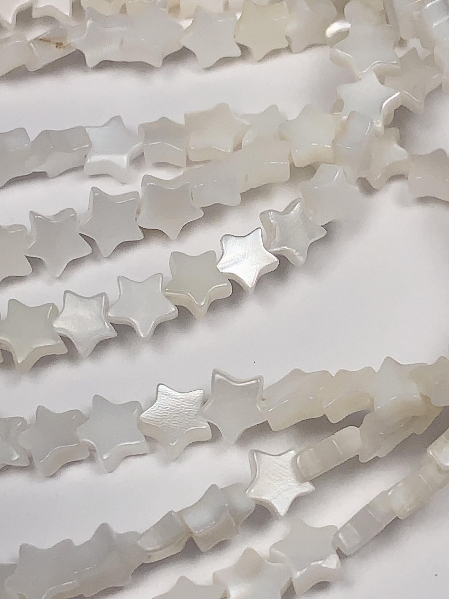 6mm AAA White Mother of Pearl Star Beads: 15" Strand