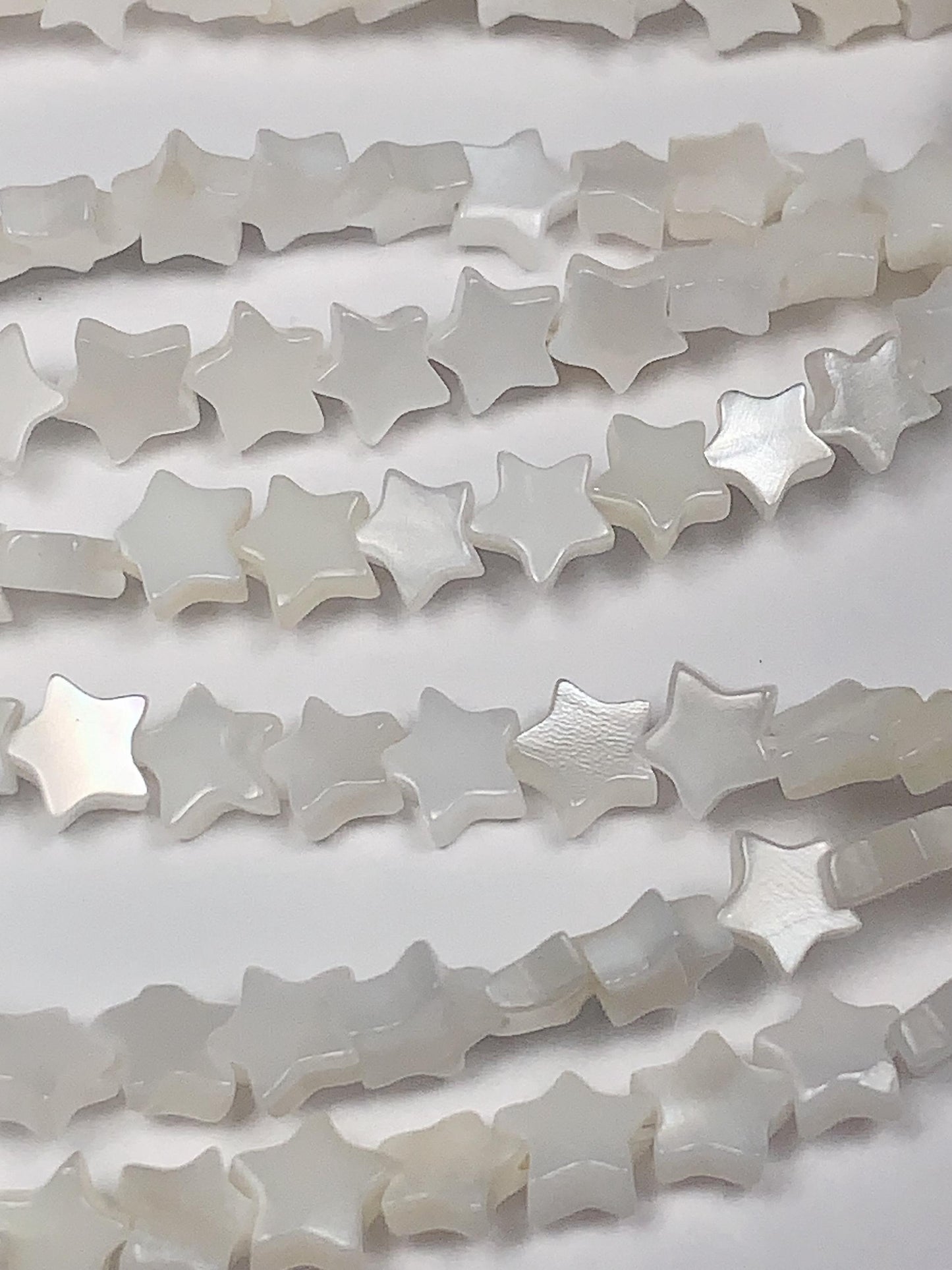 6mm AAA White Mother of Pearl Star Beads: 15" Strand