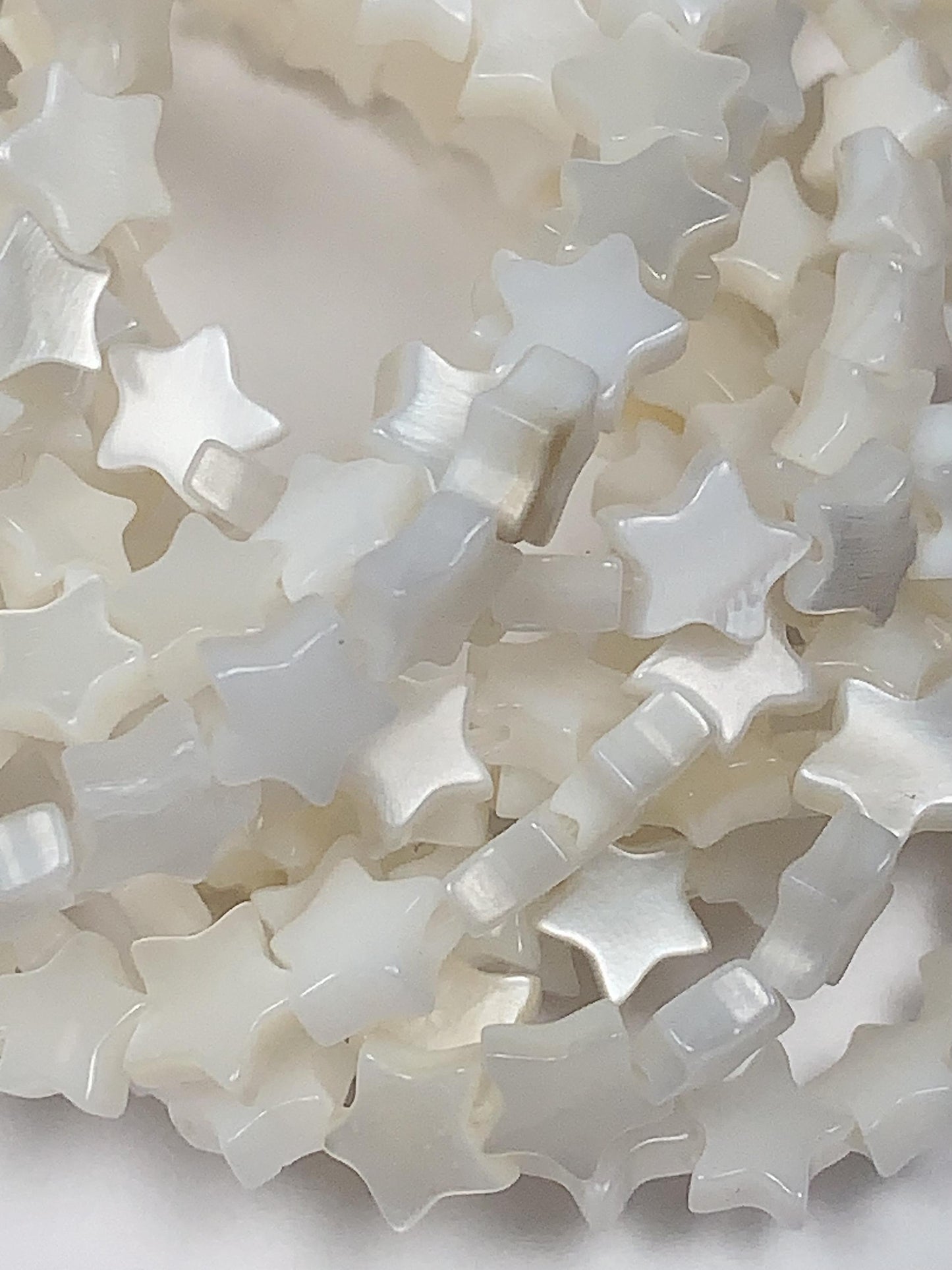 6mm AAA White Mother of Pearl Star Beads: 15" Strand