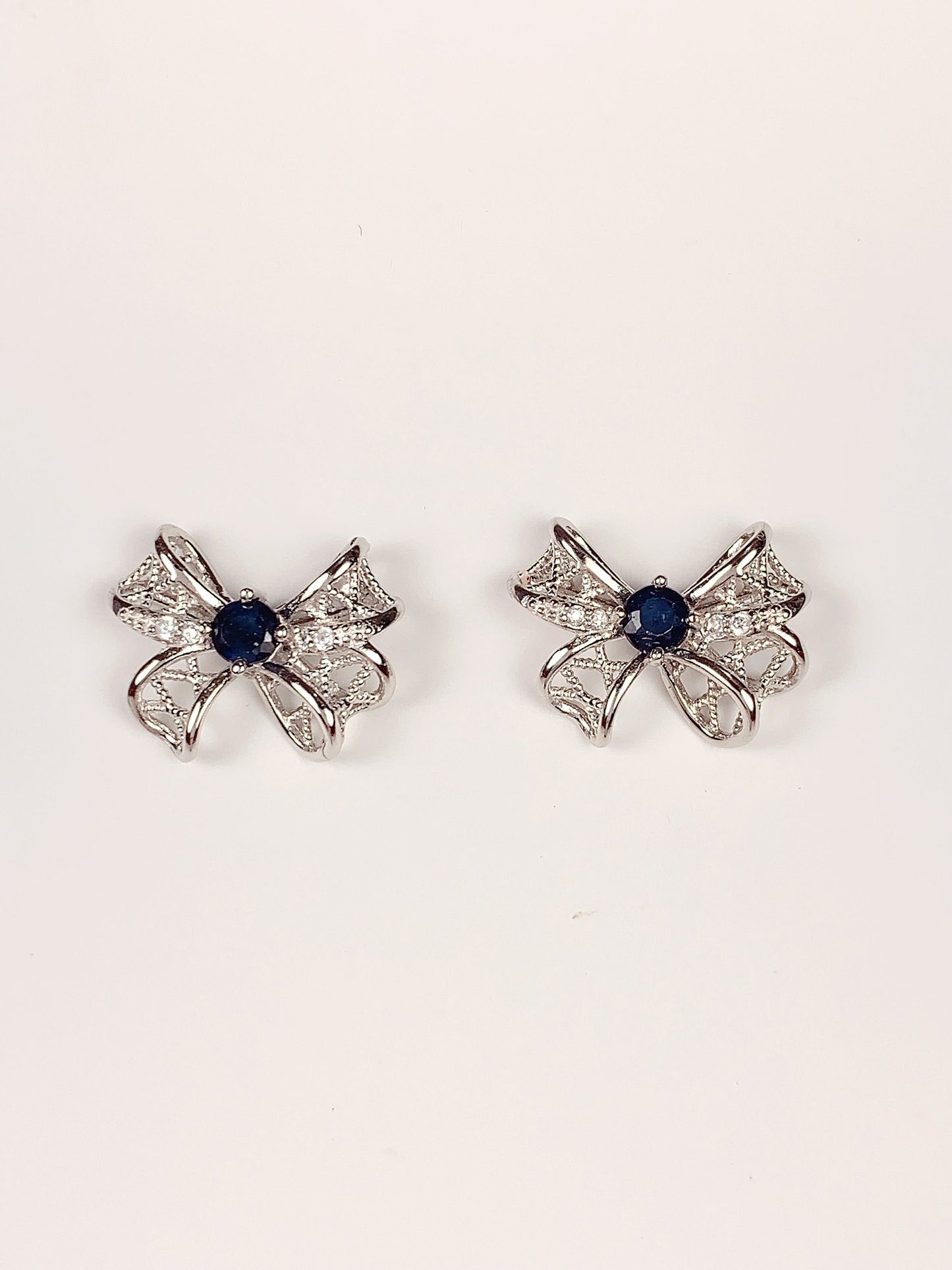 Blue Sapphire Sterling Silver Earrings: 18K White Gold Plated Bow