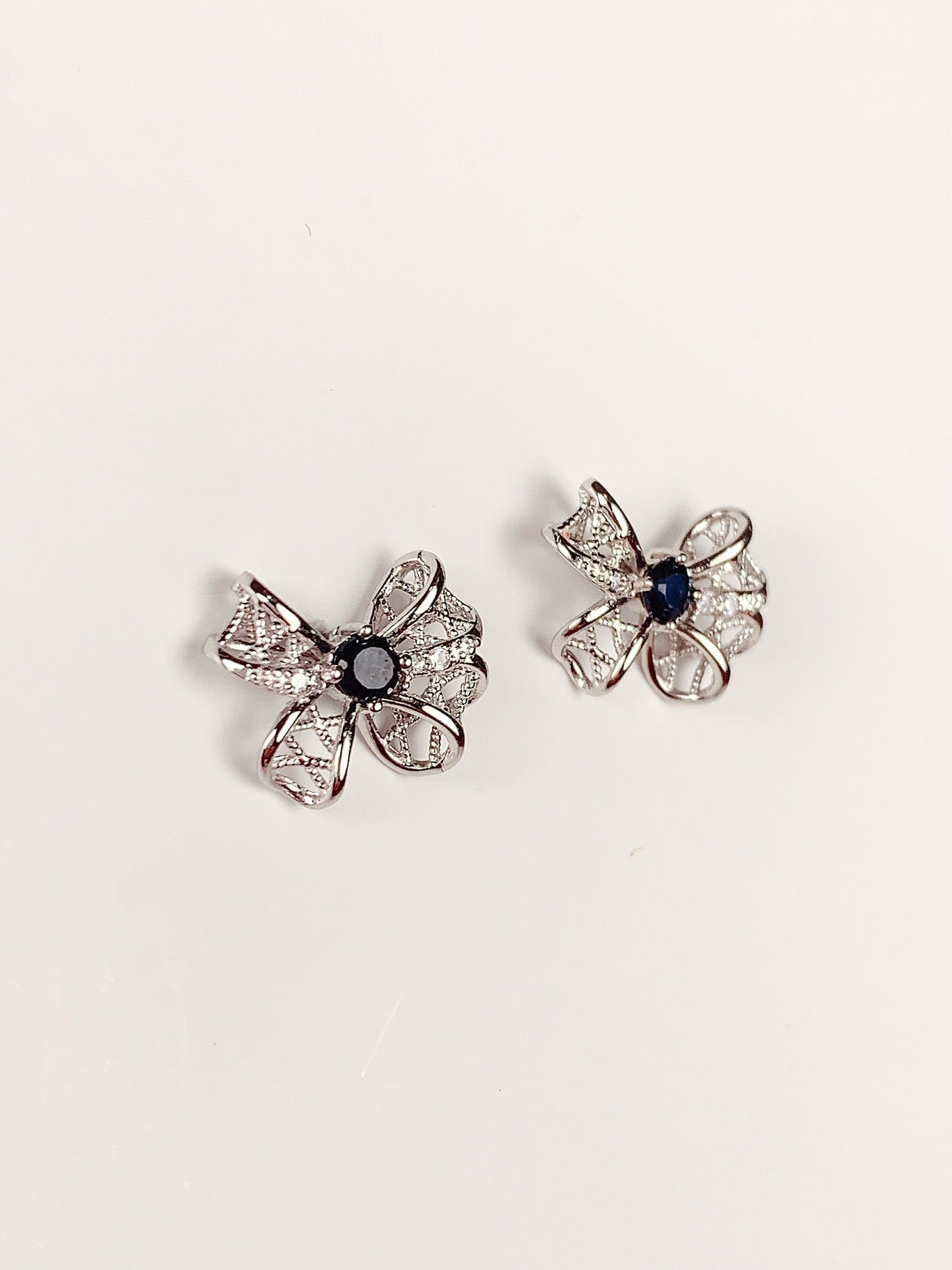 Blue Sapphire Sterling Silver Earrings: 18K White Gold Plated Bow