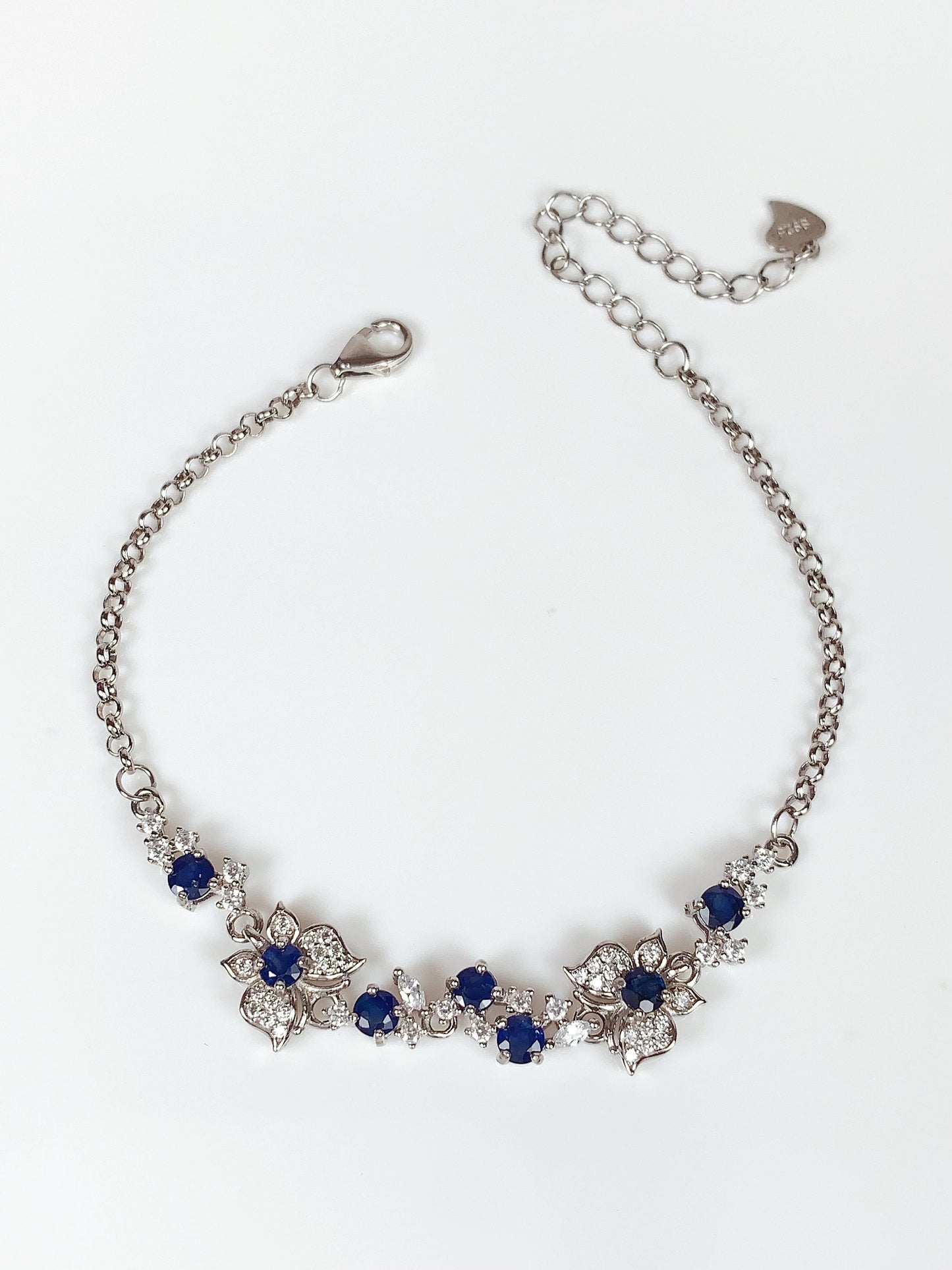Blue Sapphire Floral Bracelet: 18K White Gold Plated Sterling Silver