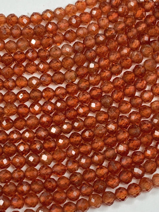 AAA+ Natural Orange Hessonite Garnet Faceted Round Beads - 15.5" Strand