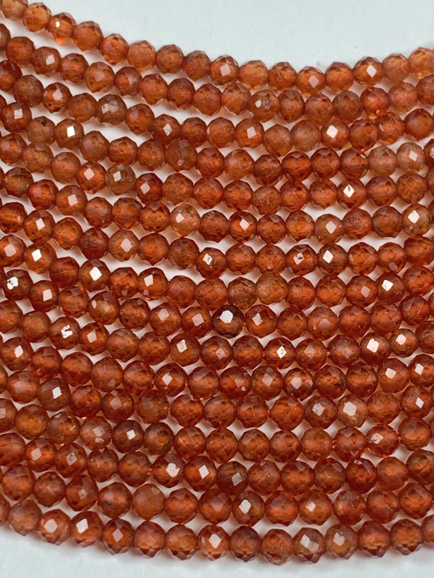 AAA+ Natural Orange Hessonite Garnet Faceted Round Beads - 15.5" Strand