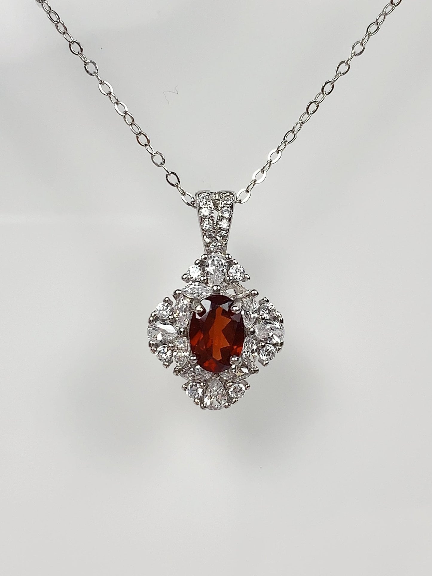 Red Garnet Sterling Silver Necklace: 18K Gold Plated Oval Pendant