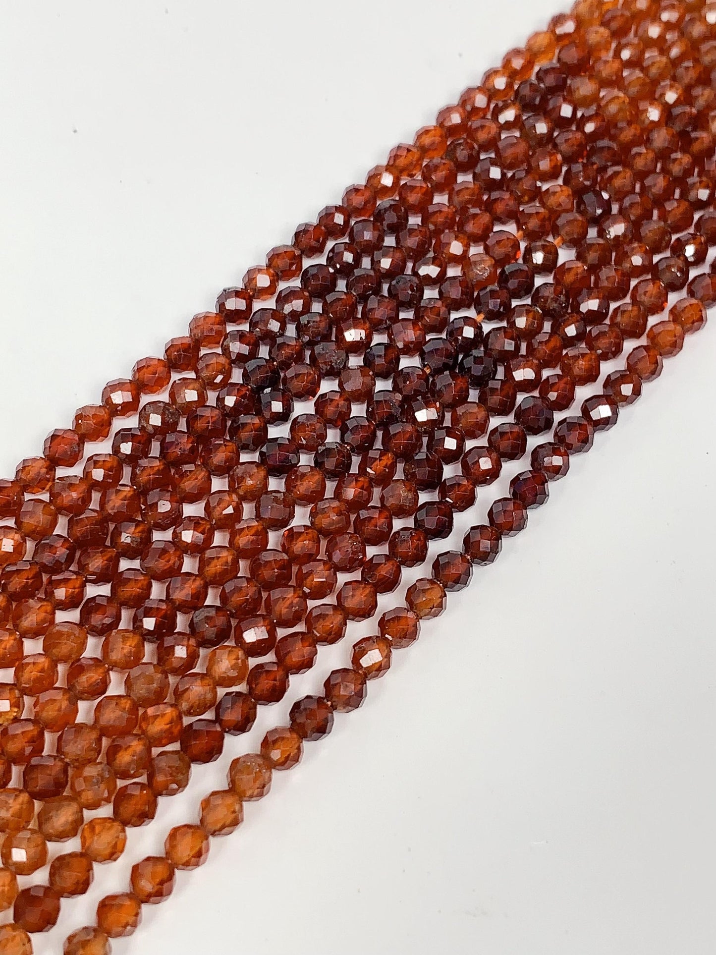 AAA+ Orange Hessonite Garnet Faceted Round Beads - 15.5" Strand