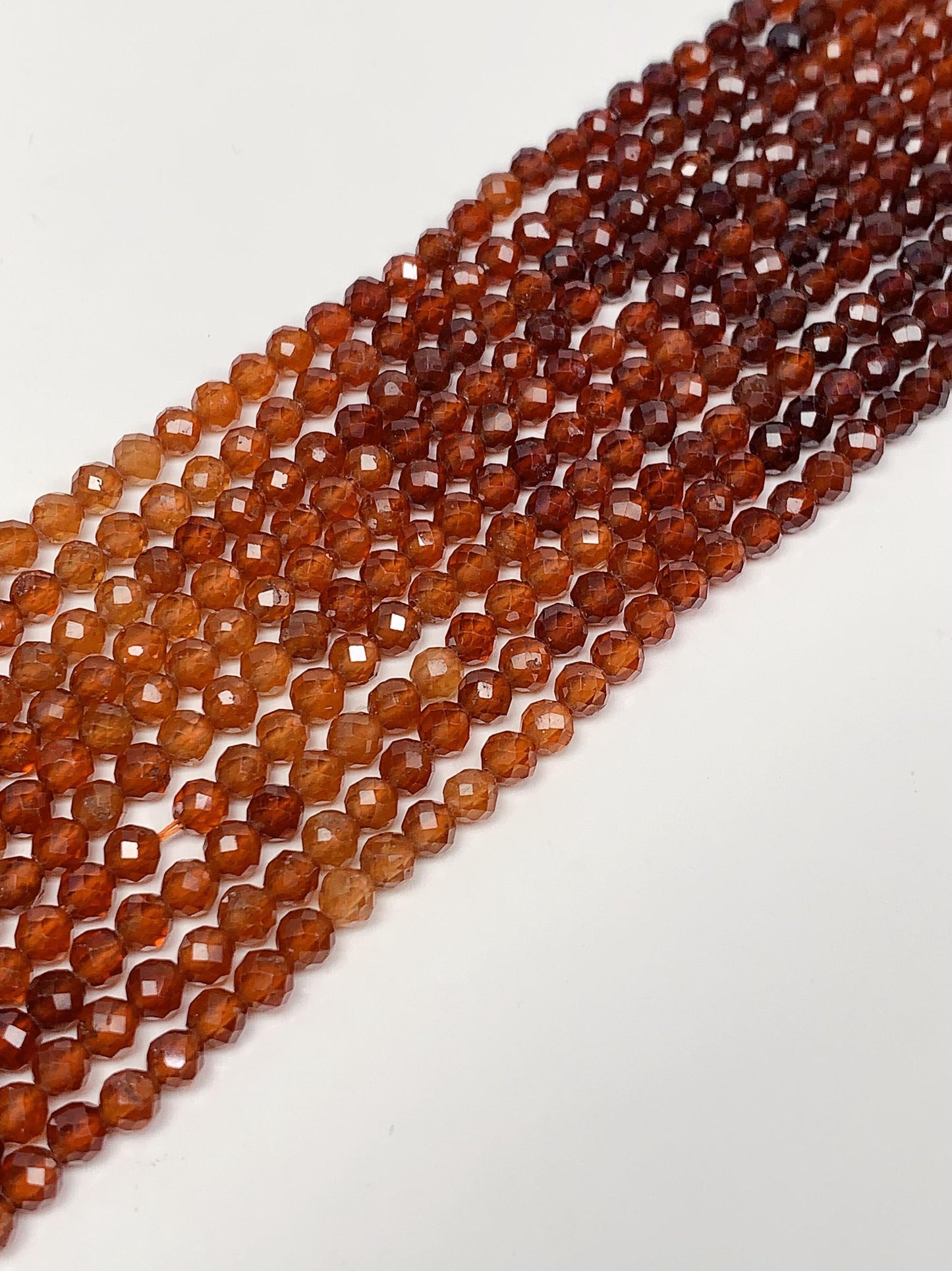 AAA+ Orange Hessonite Garnet Faceted Round Beads - 15.5" Strand