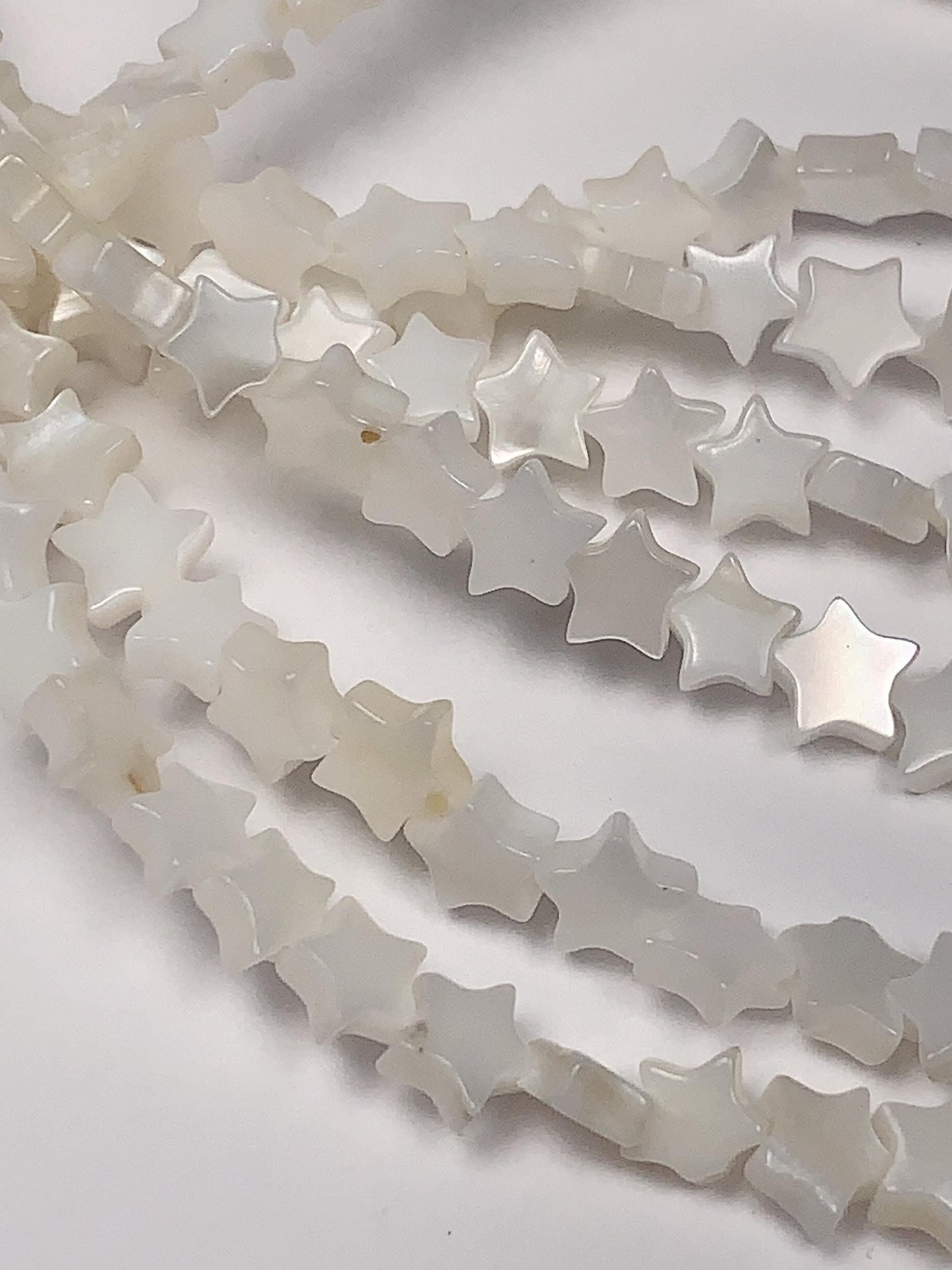 6mm AAA White Mother of Pearl Star Beads: 15" Strand