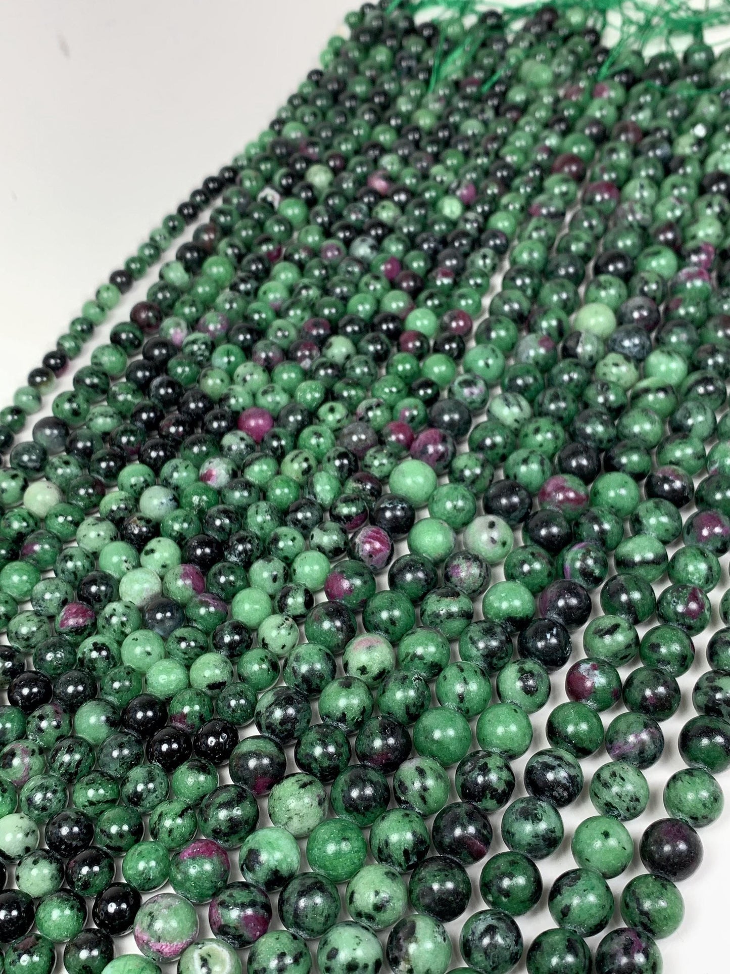 Natural Ruby Zoisite Beads: Smooth Round Gemstone Strand (15.5")