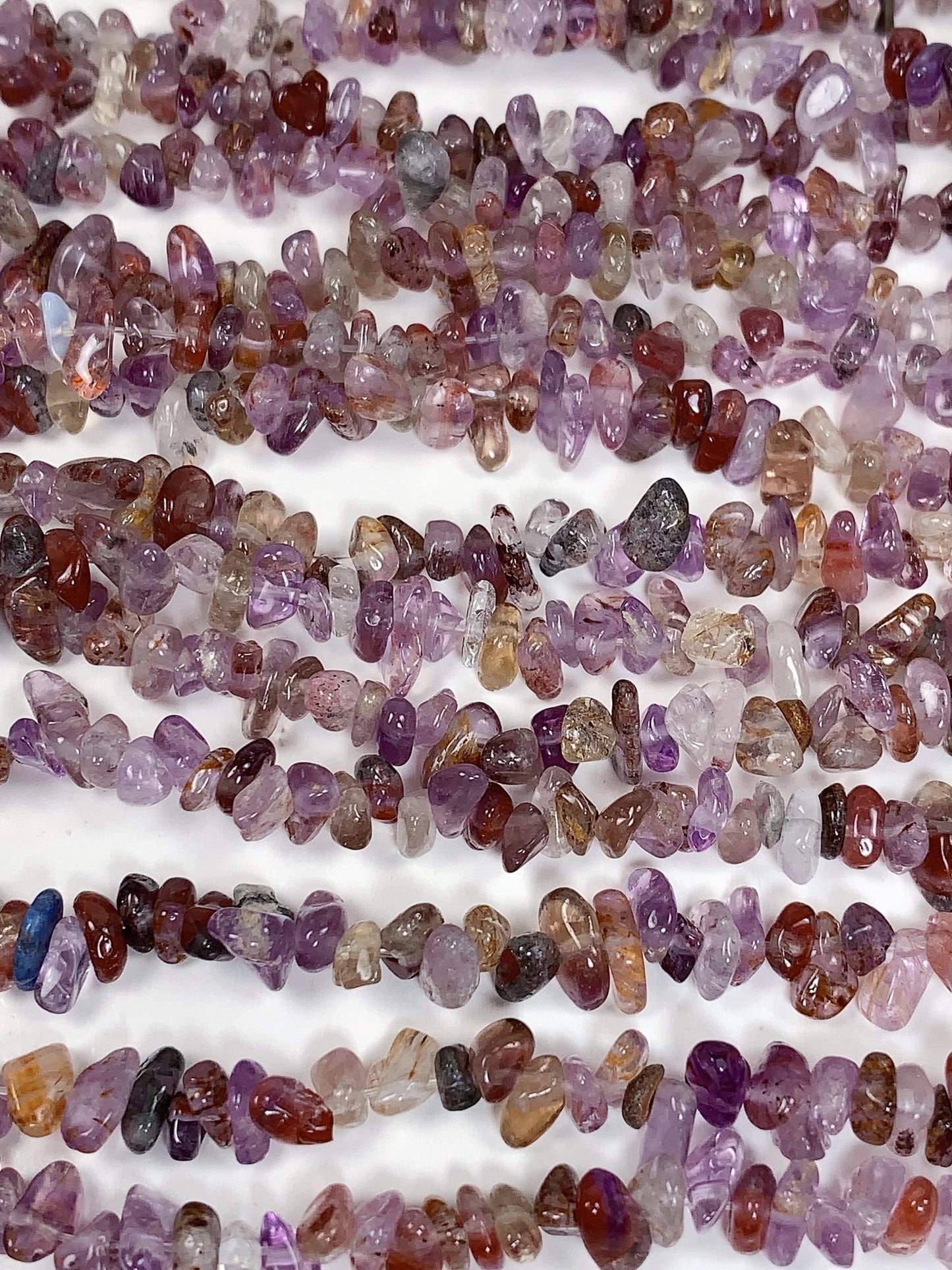 Super 7 Crystal Chip Beads: Natural Amethyst Cacoxenite Quartz (32" Strand)