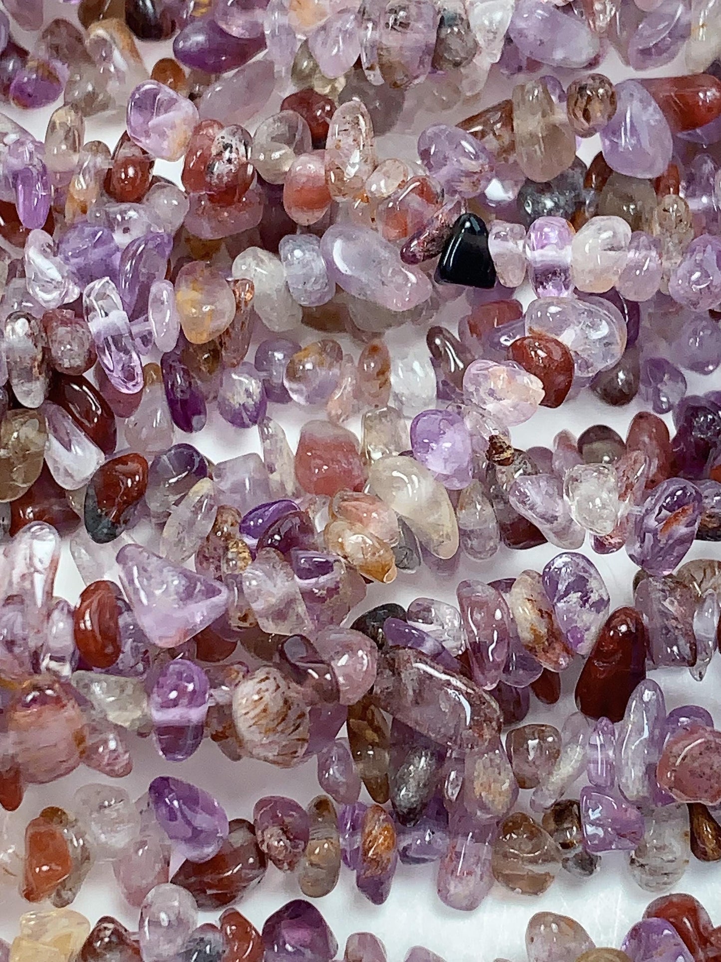 Super 7 Crystal Chip Beads: Natural Amethyst Cacoxenite Quartz (32" Strand)