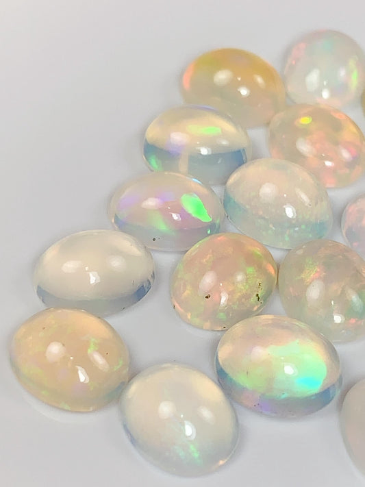 Natural Rainbow Opal Gemstone: 10mm x 8mm Oval Cut Loose Gem