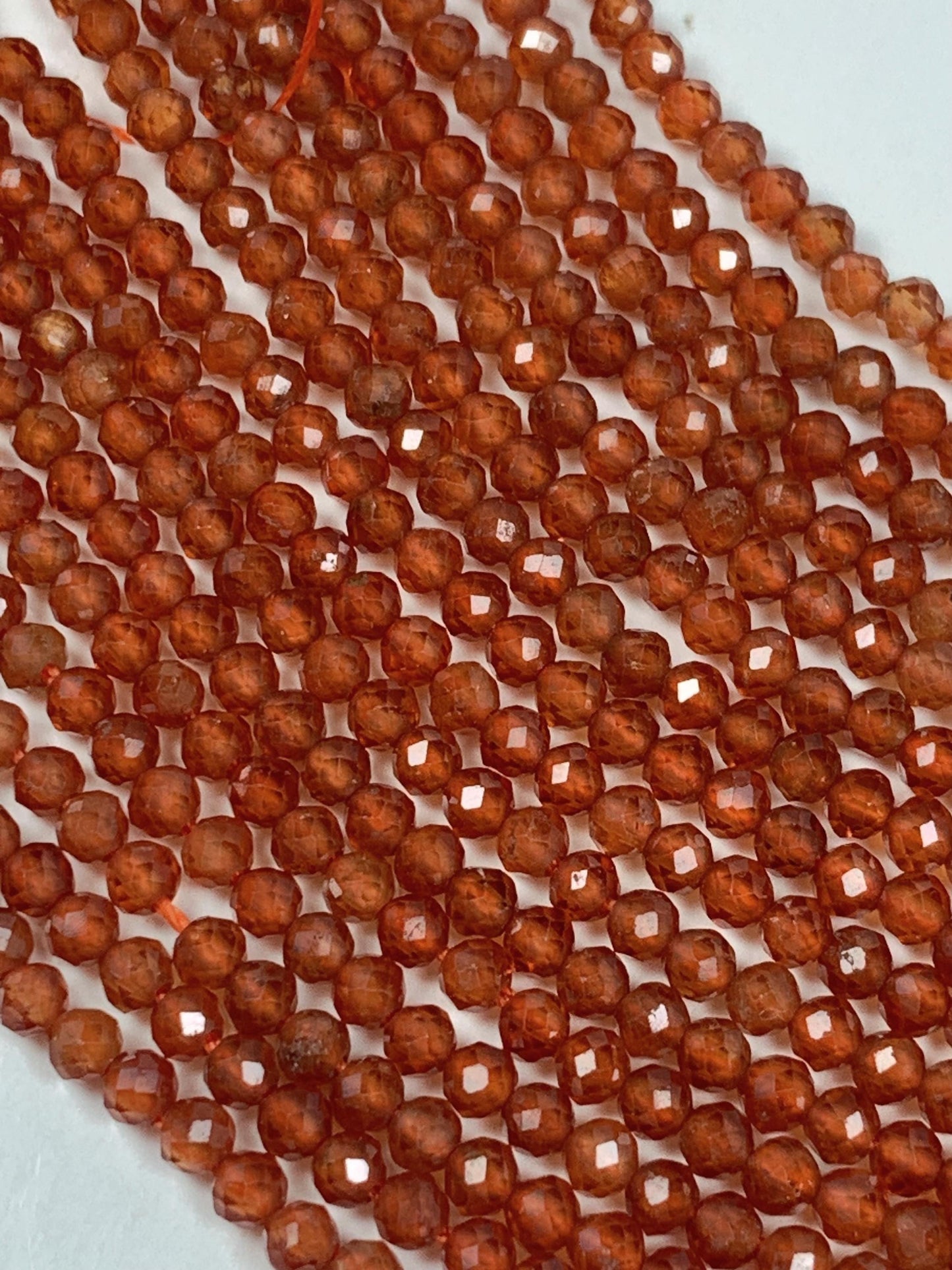 AAA+ Natural Orange Hessonite Garnet Faceted Round Beads - 15.5" Strand