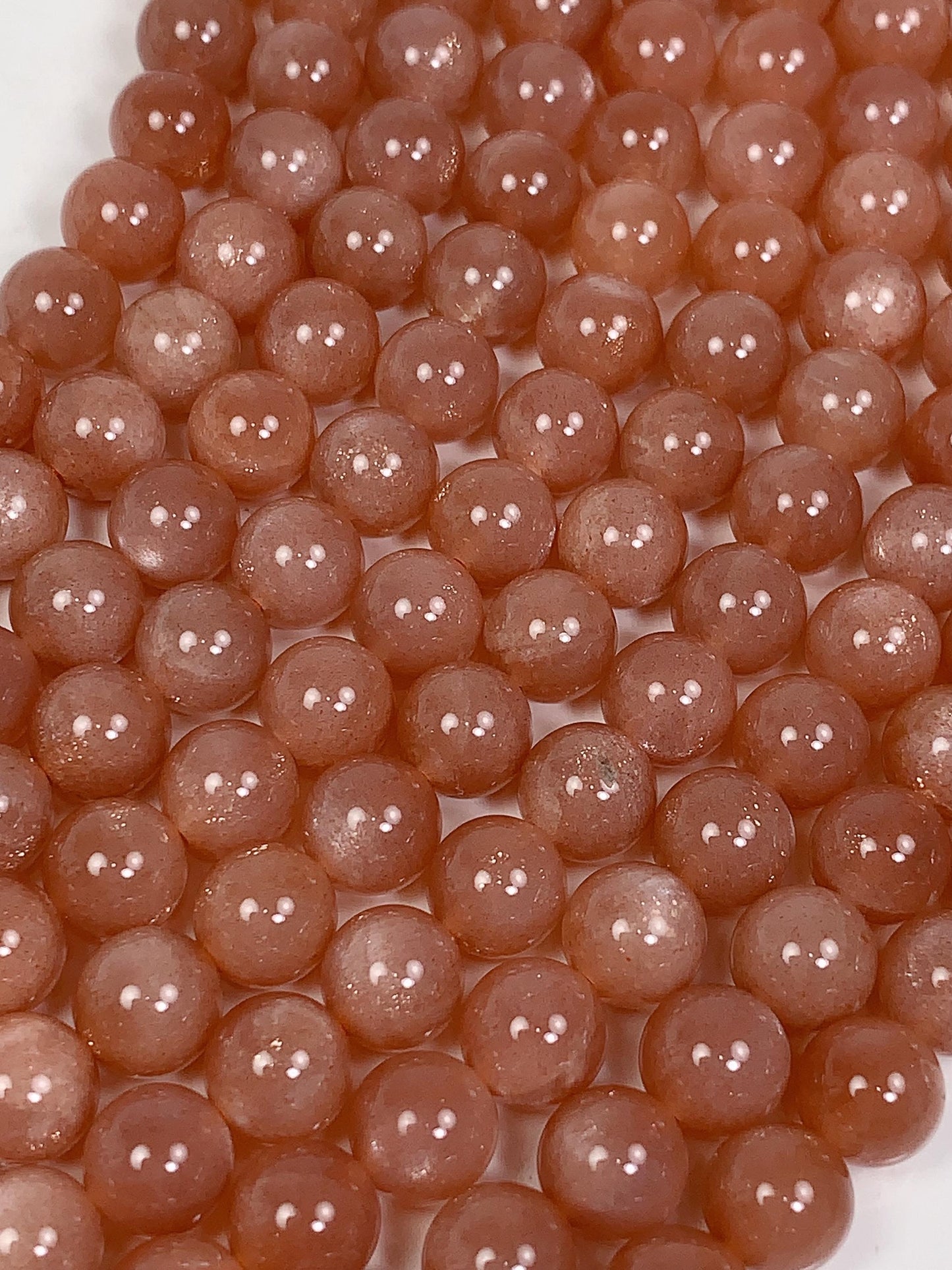 AAA Golden Peach Sunstone Beads: 15.5" Smooth Round Strand