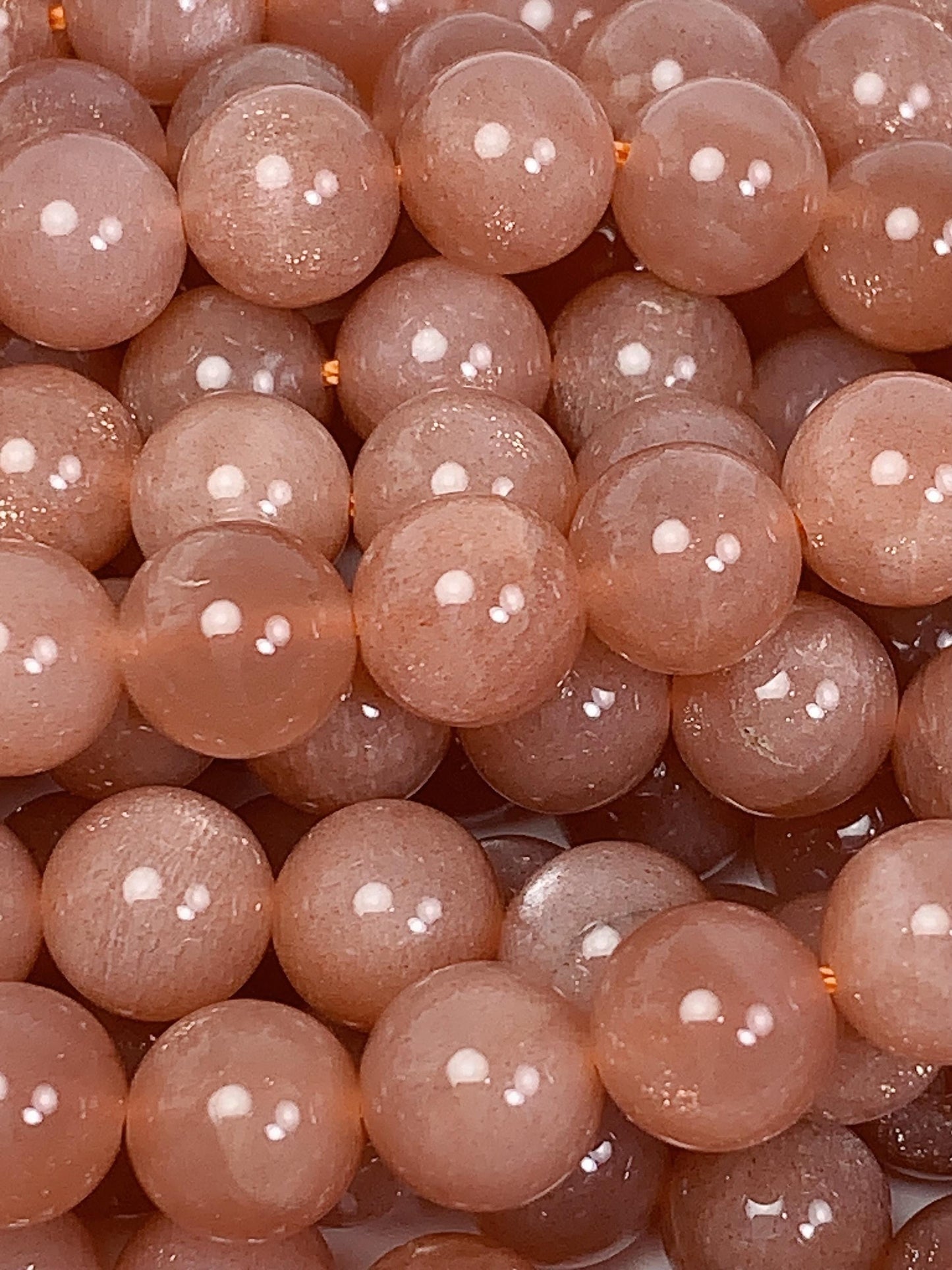 AAA Golden Peach Sunstone Beads: 15.5" Smooth Round Strand