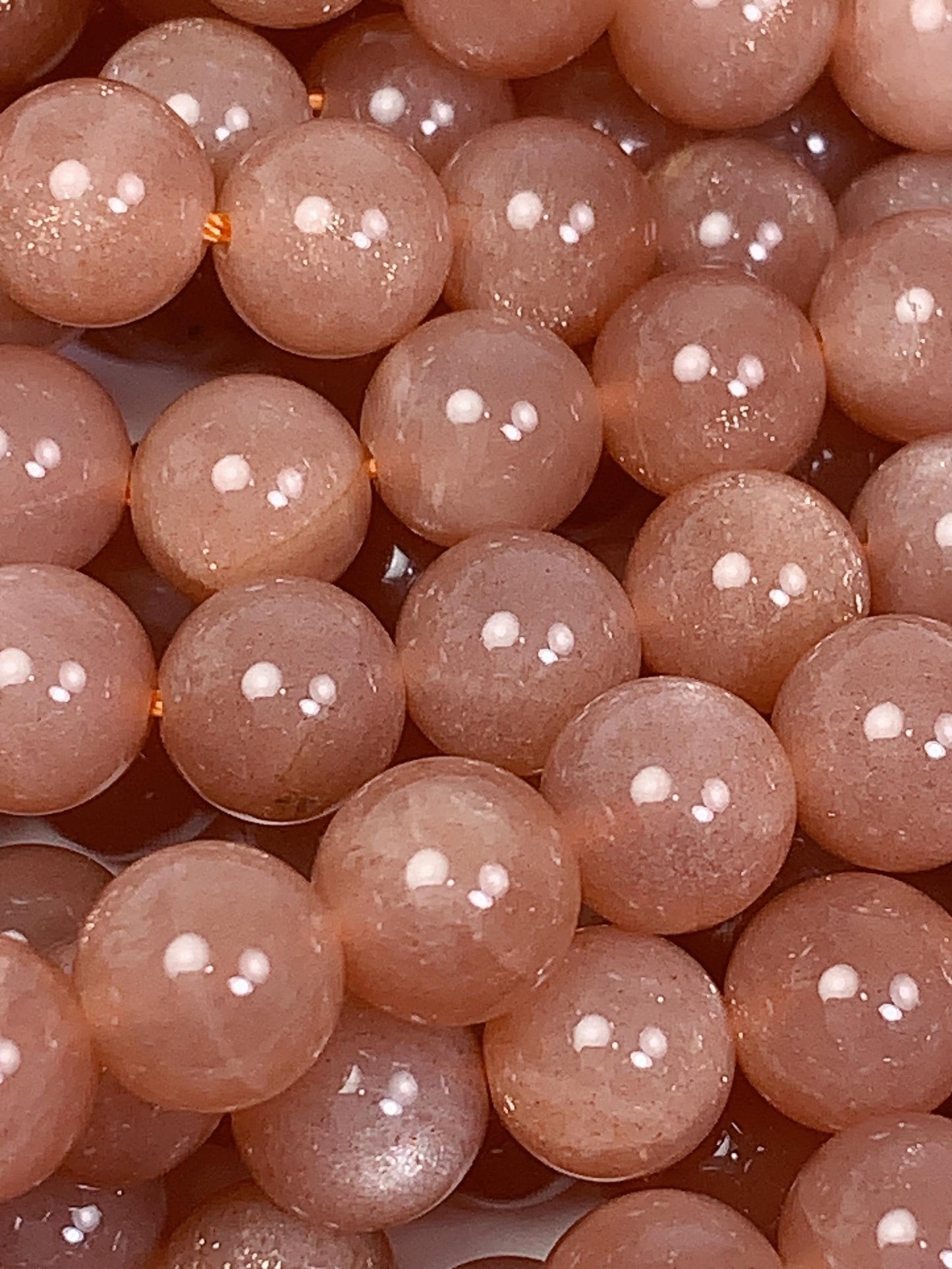 AAA Golden Peach Sunstone Beads: 15.5" Smooth Round Strand