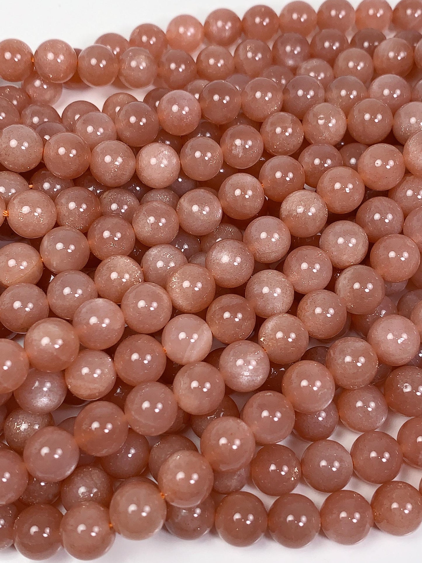 AAA Golden Peach Sunstone Beads: 15.5" Smooth Round Strand