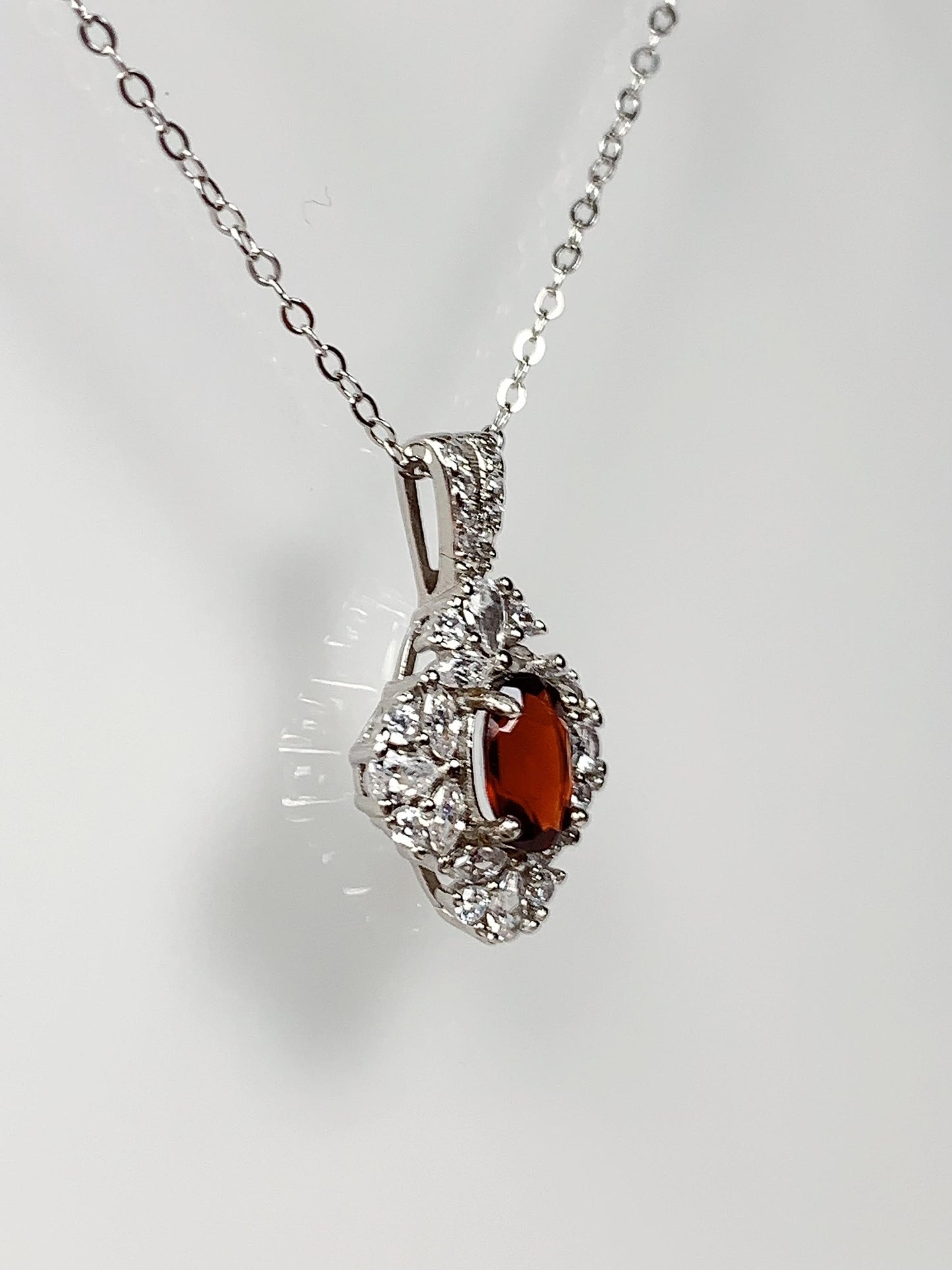 Red Garnet Sterling Silver Necklace: 18K Gold Plated Oval Pendant