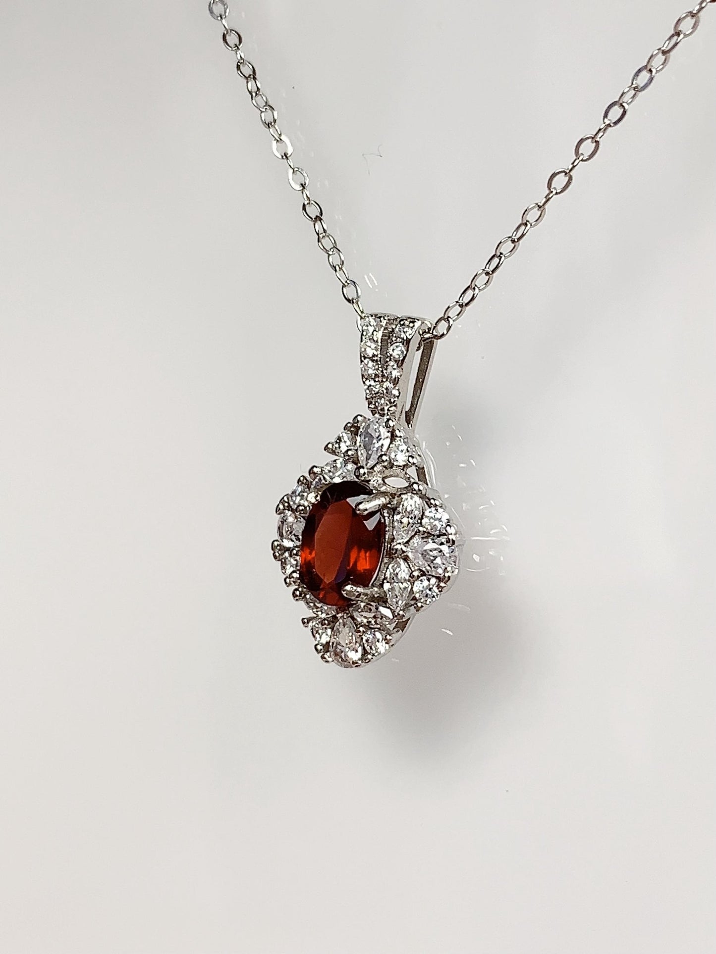 Red Garnet Sterling Silver Necklace: 18K Gold Plated Oval Pendant