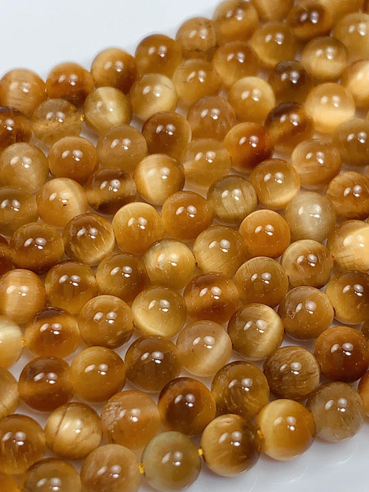 Natural Golden Yellow Tiger's Eye Smooth Round Beads - 15.5" Strand