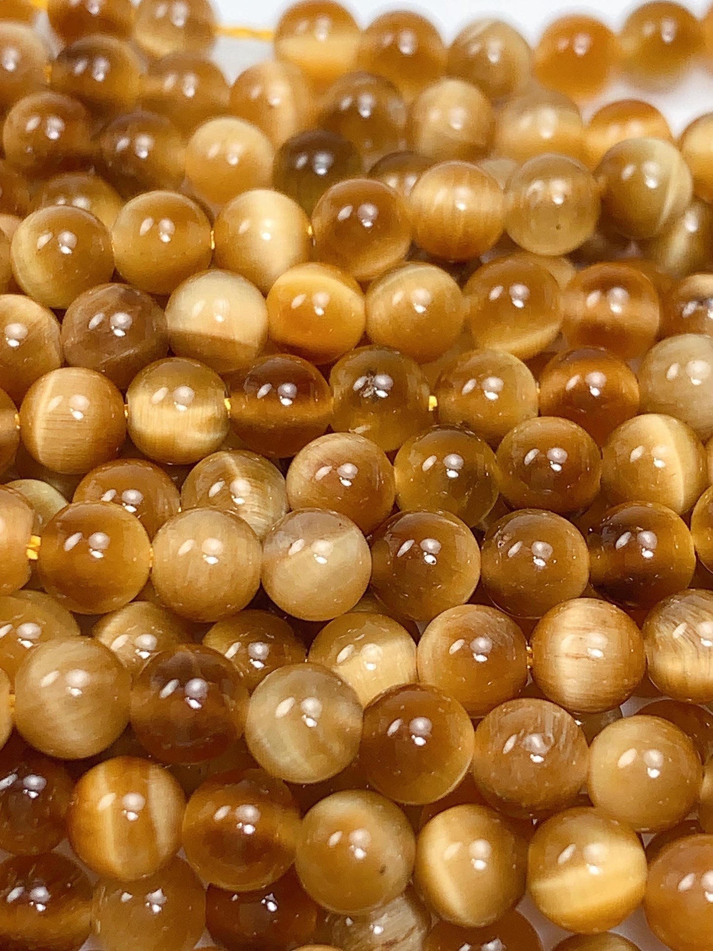 Natural Golden Yellow Tiger's Eye Smooth Round Beads - 15.5" Strand