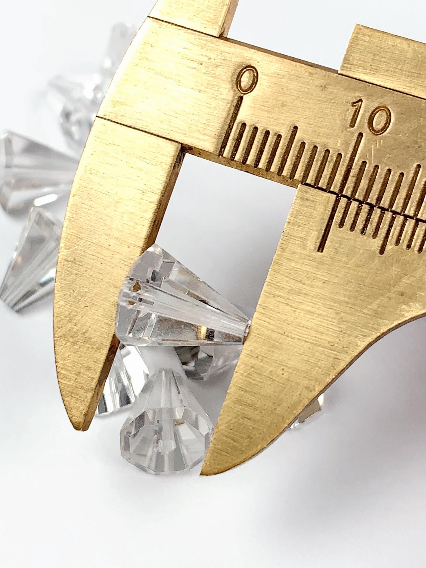 AAA White Clear Quartz Gemstone: Faceted Cone Cut (10mm x 8mm)
